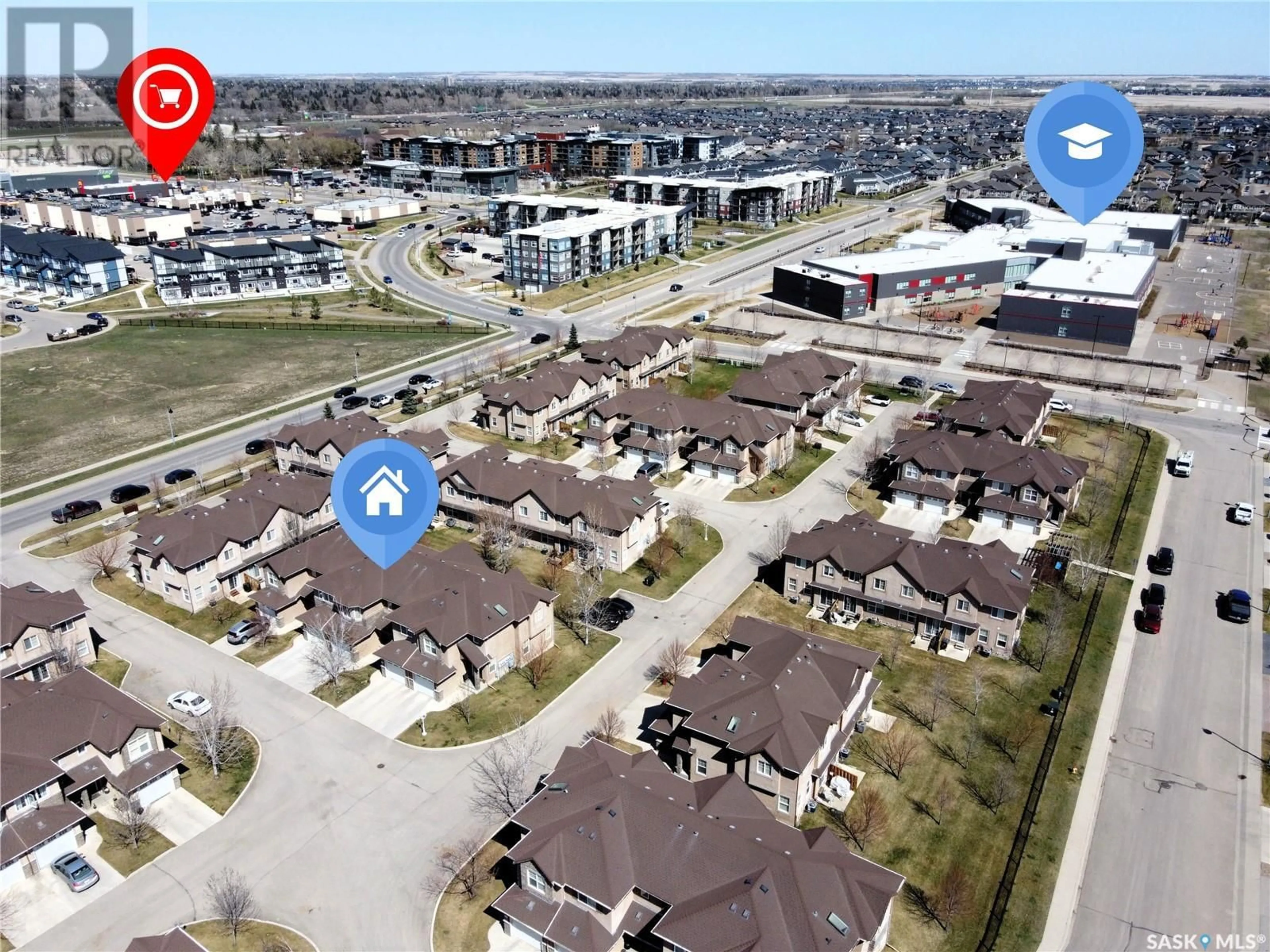 A pic from outside/outdoor area/front of a property/back of a property/a pic from drone, street for 207 - 710 GORDON ROAD, Saskatoon Saskatchewan S7T0J5