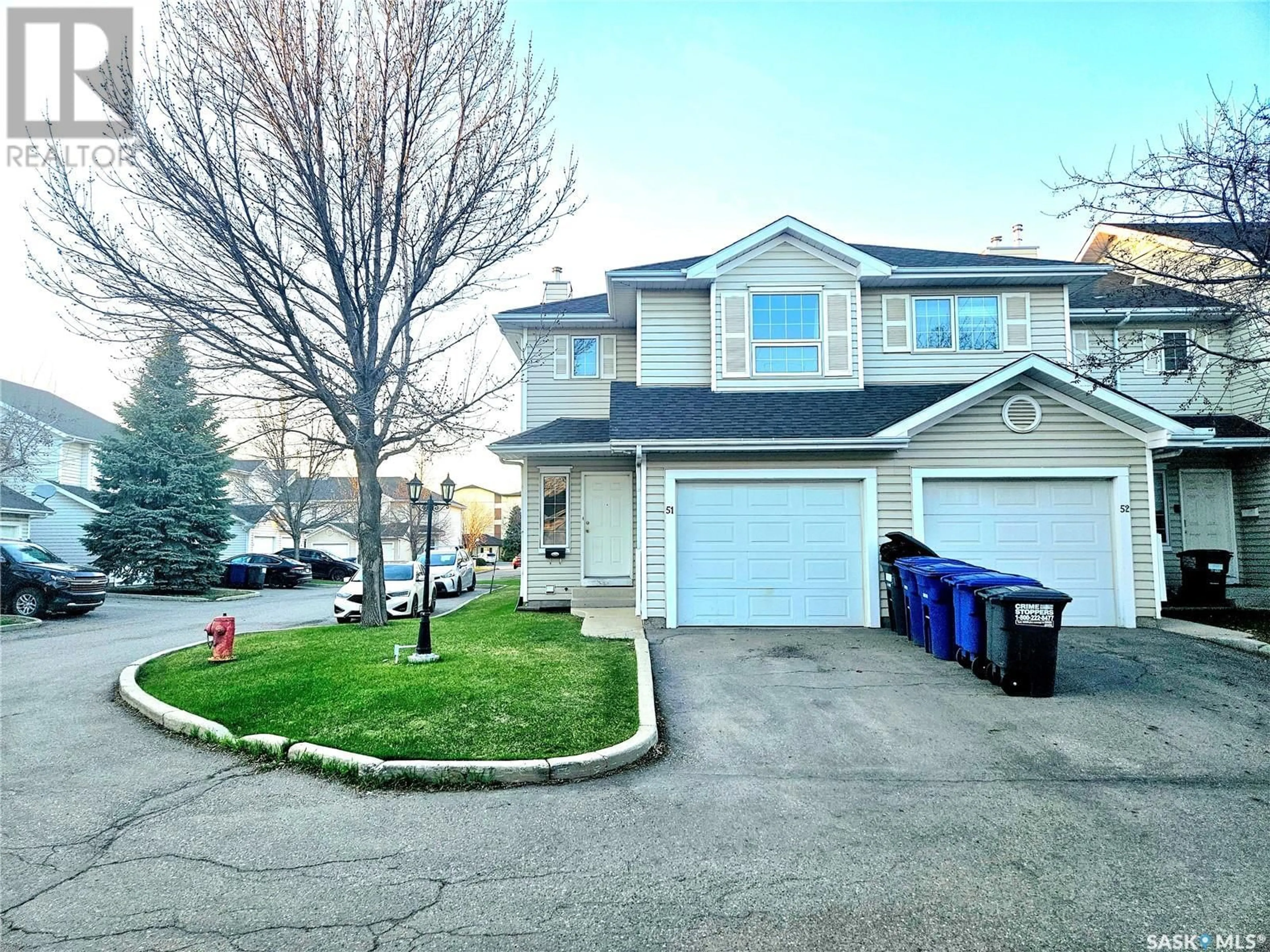 A pic from outside/outdoor area/front of a property/back of a property/a pic from drone, street for 110 - 51 KEEVIL CRESCENT, Saskatoon Saskatchewan S7N4N8