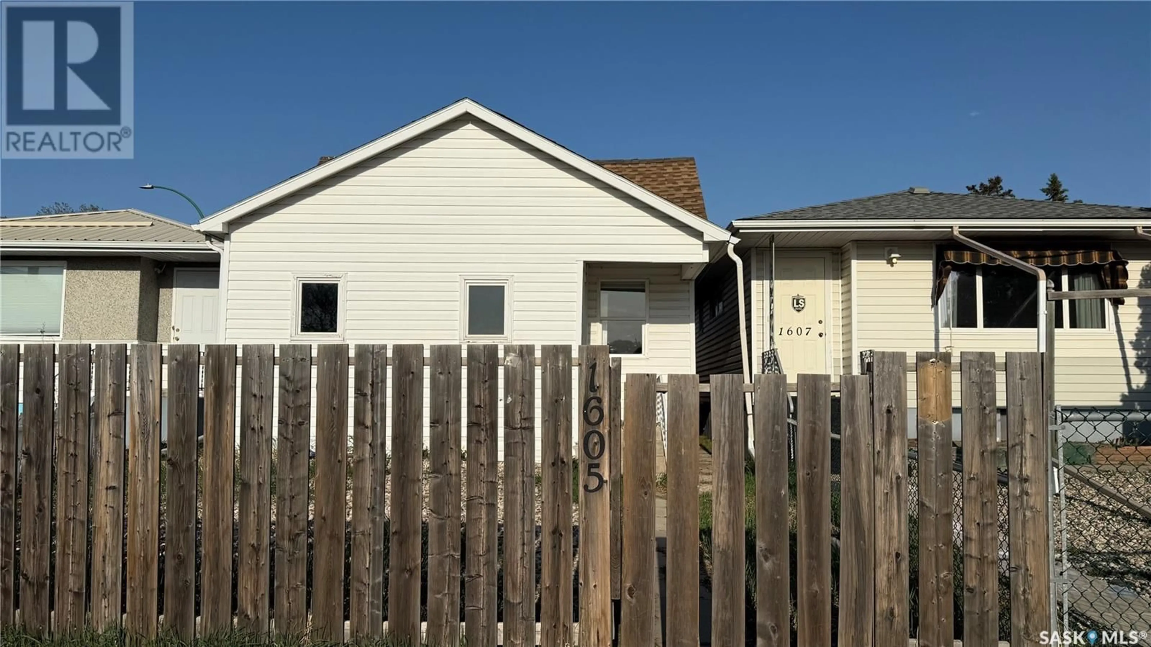 Home with vinyl exterior material, street for 1605 RETALLACK STREET, Regina Saskatchewan S4T2J6