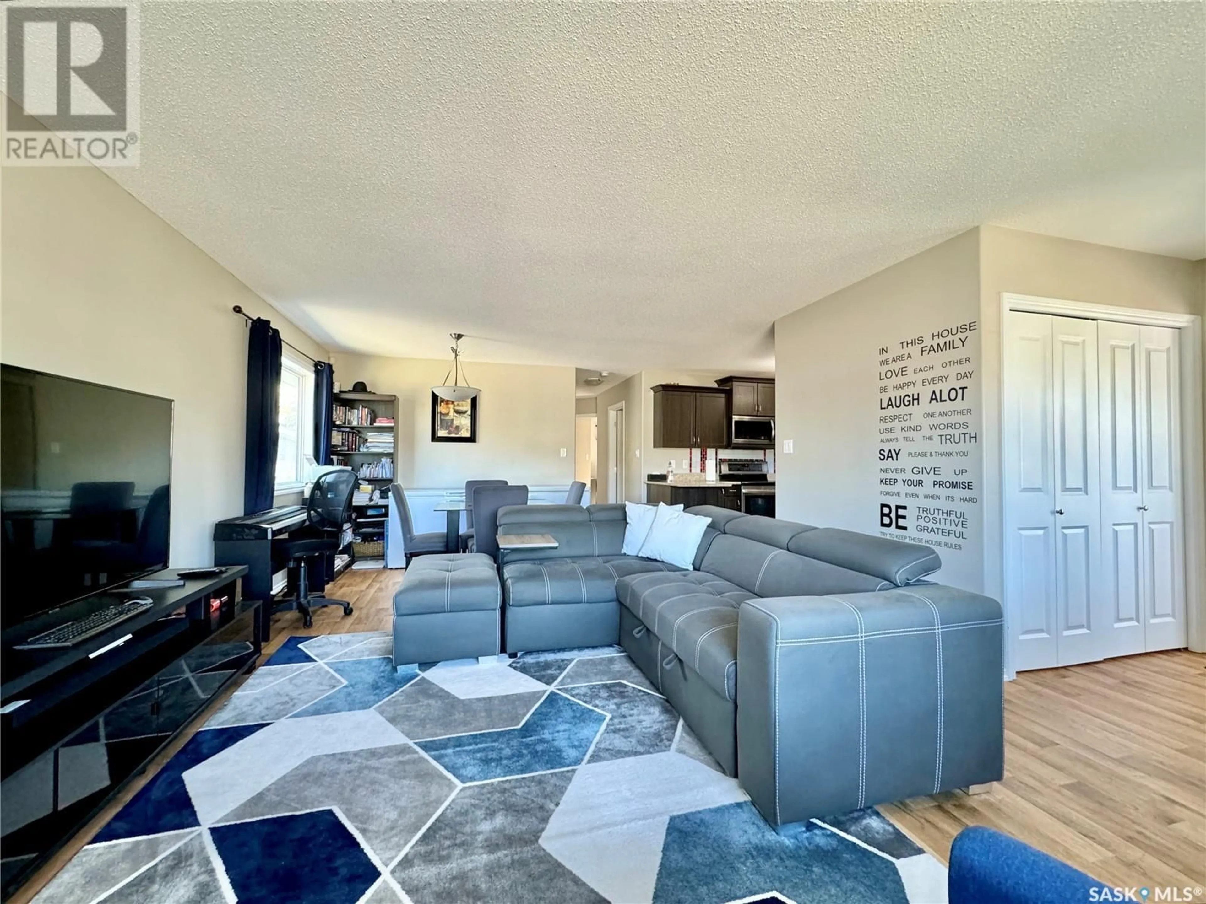 Living room with furniture, unknown for 8 CJ HOUSTON PLACE, Yorkton Saskatchewan S3N4J3