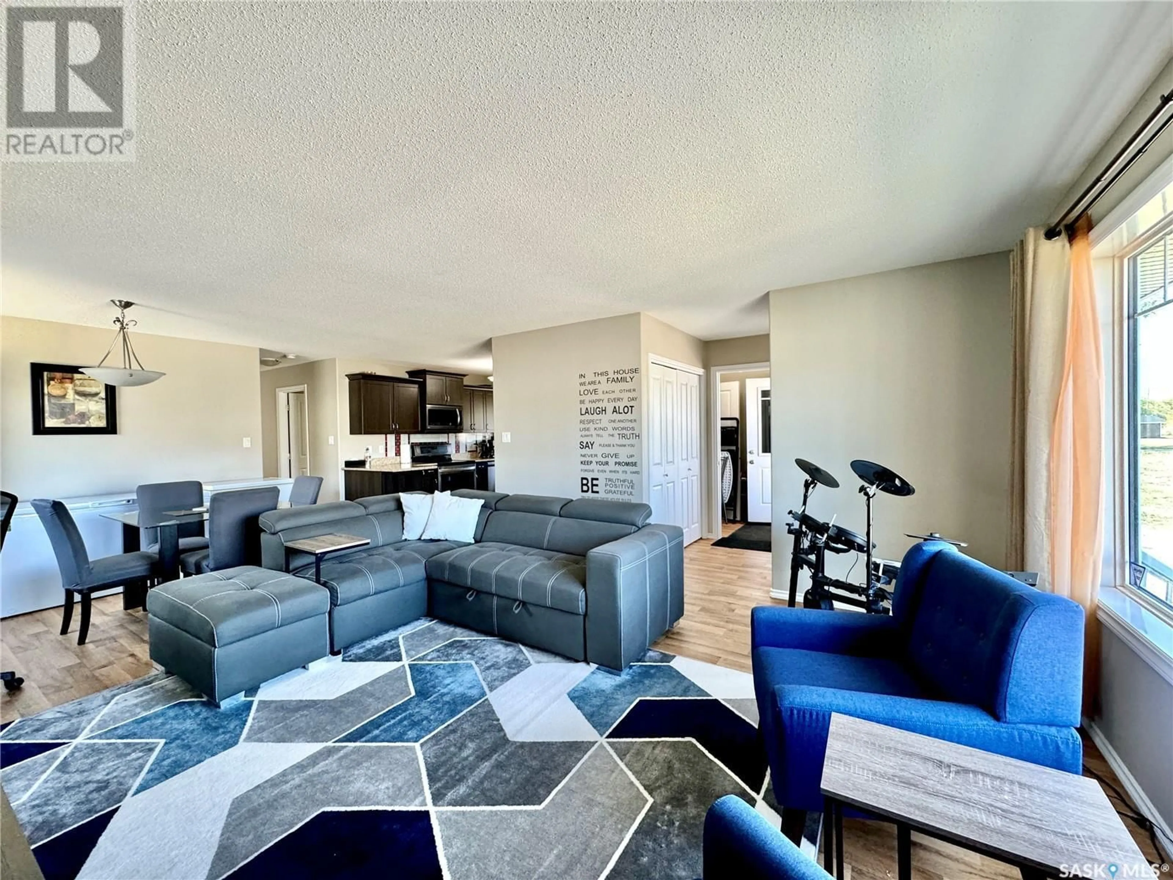 Living room with furniture, unknown for 8 CJ HOUSTON PLACE, Yorkton Saskatchewan S3N4J3