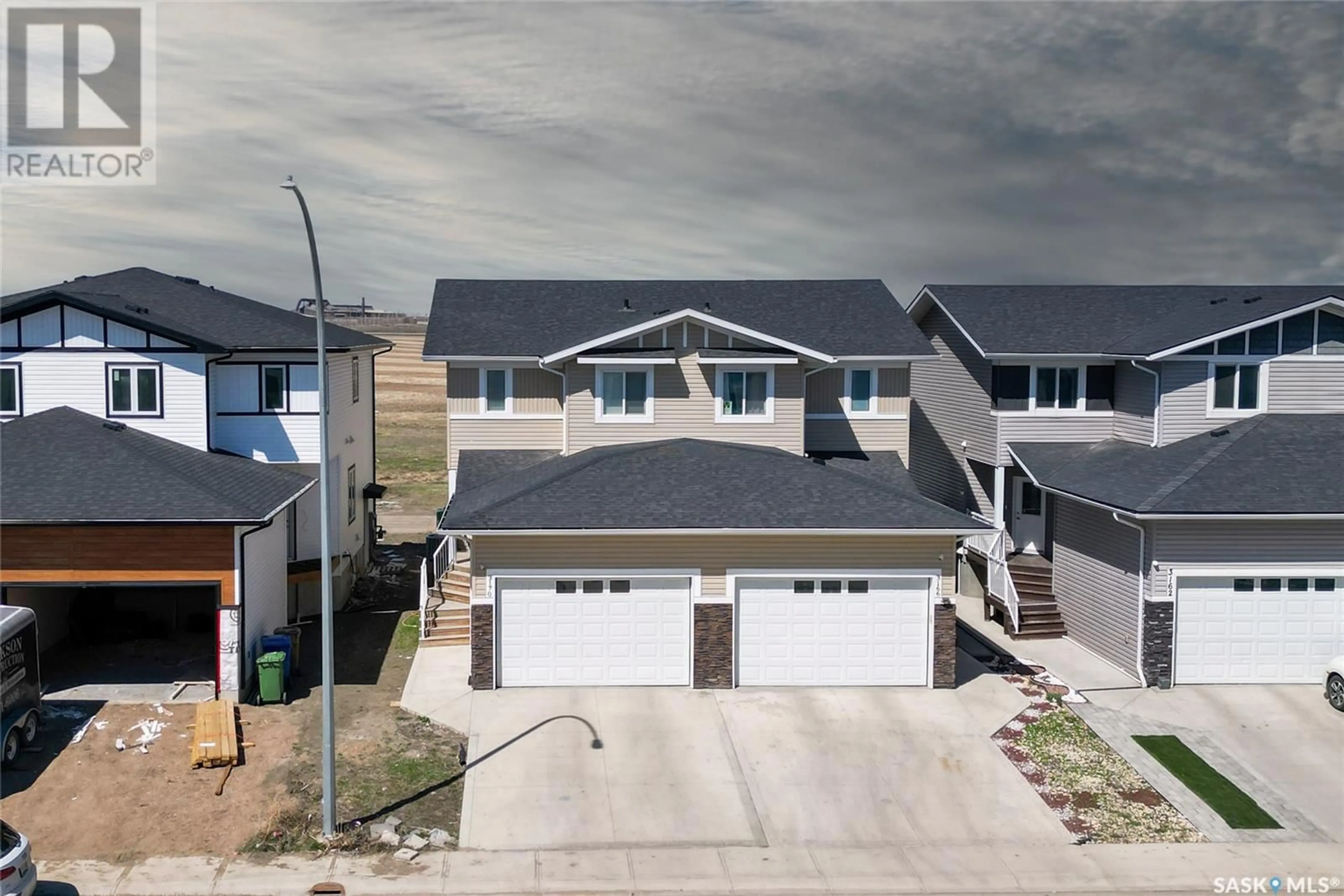 A pic from outside/outdoor area/front of a property/back of a property/a pic from drone, street for 3170 MAZURAK CRESCENT, Regina Saskatchewan S4X0N2
