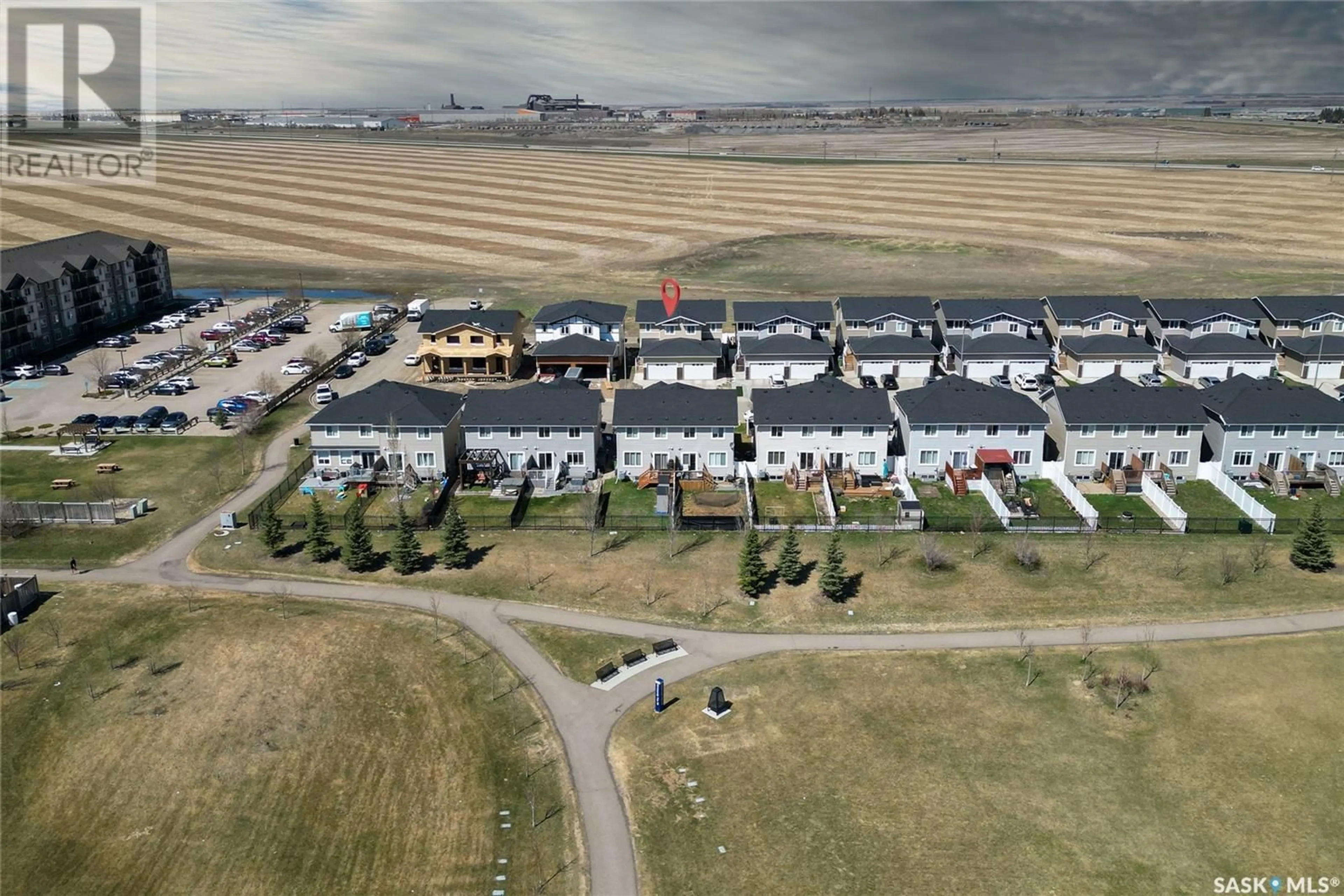 A pic from outside/outdoor area/front of a property/back of a property/a pic from drone, unknown for 3170 MAZURAK CRESCENT, Regina Saskatchewan S4X0N2