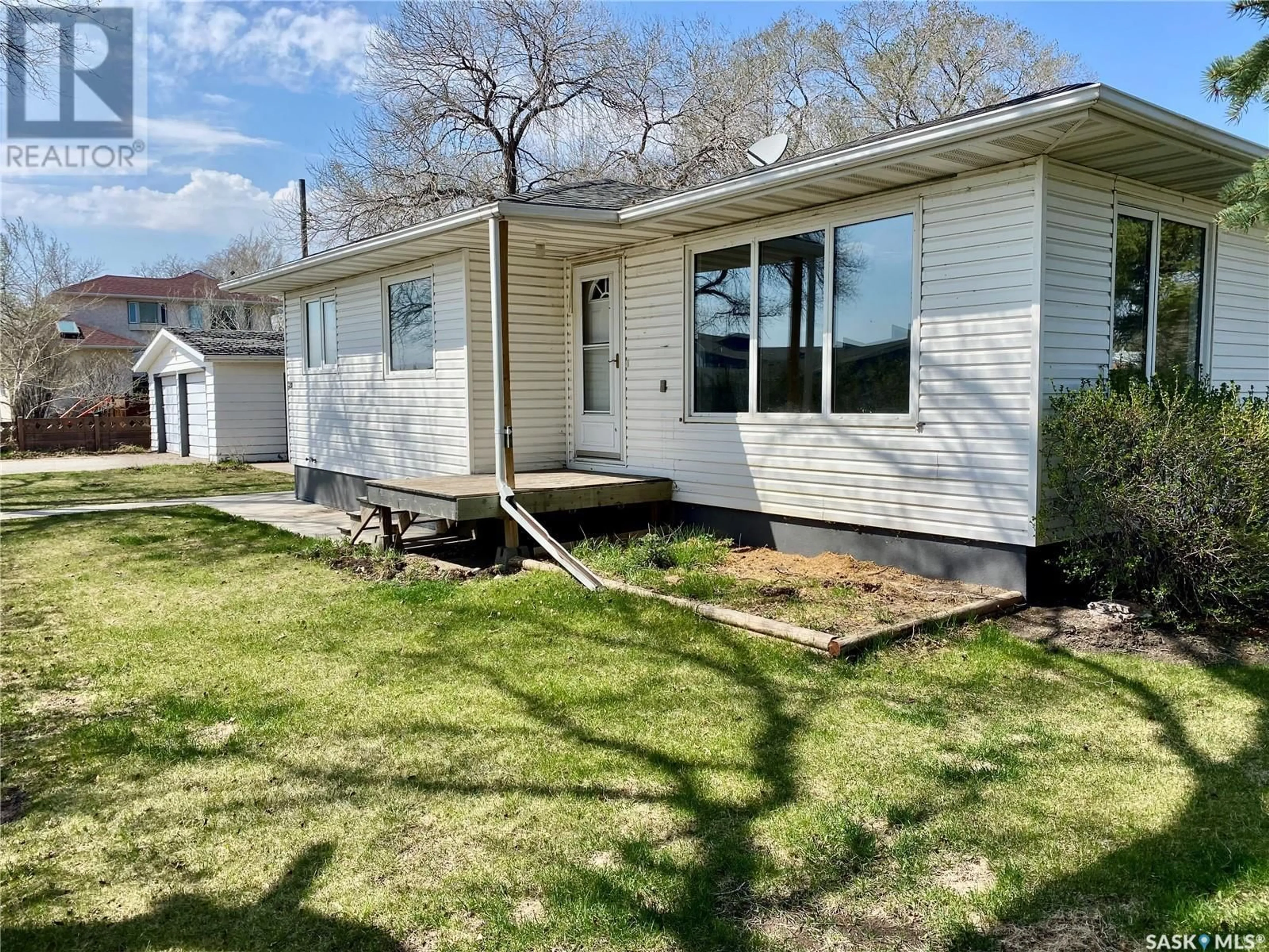 A pic from outside/outdoor area/front of a property/back of a property/a pic from drone, street for E - 320 2 STREET, Carnduff Saskatchewan S0C0S0