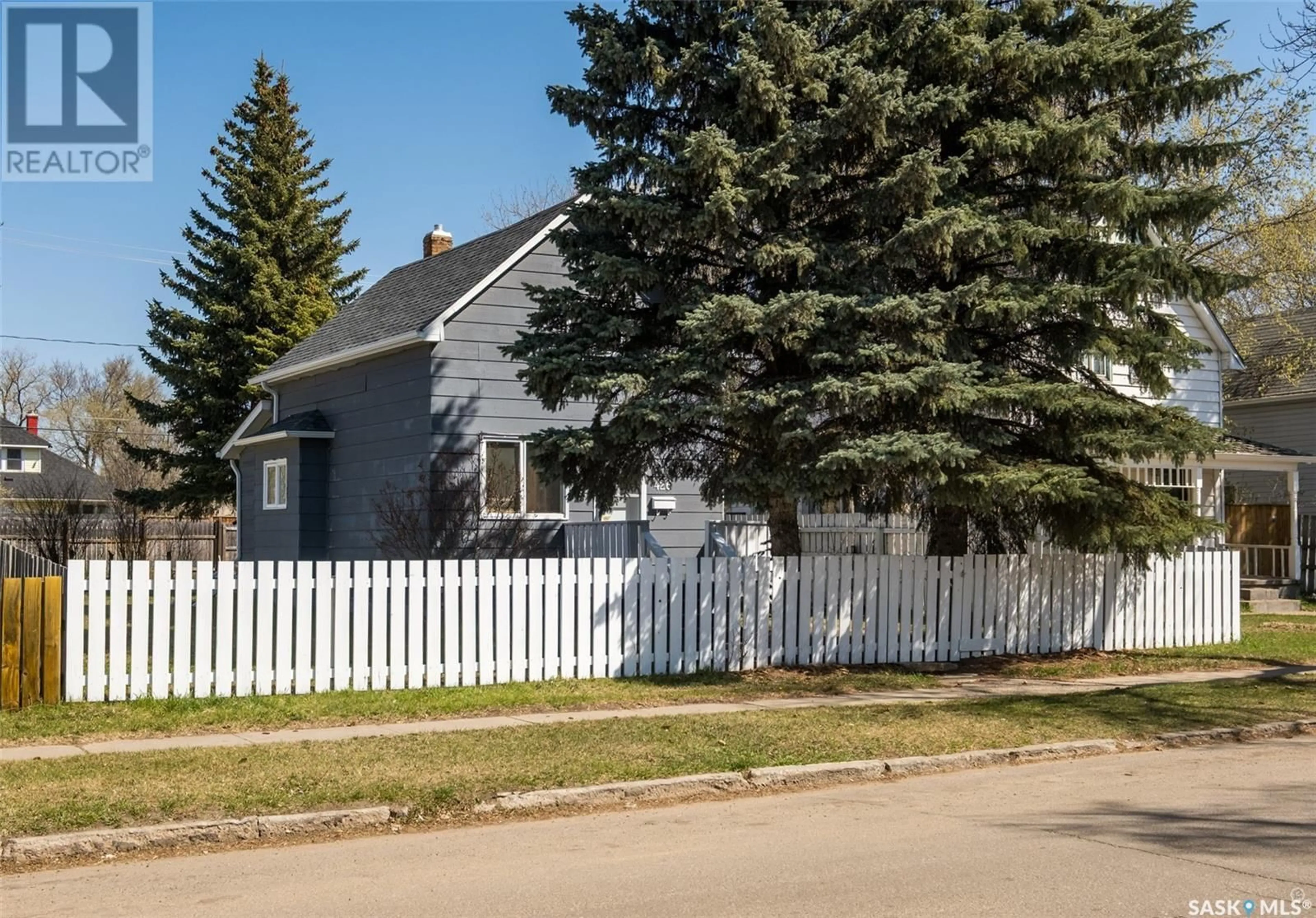 Home with vinyl exterior material, street for 426 10TH STREET, Prince Albert Saskatchewan S6V0Z4