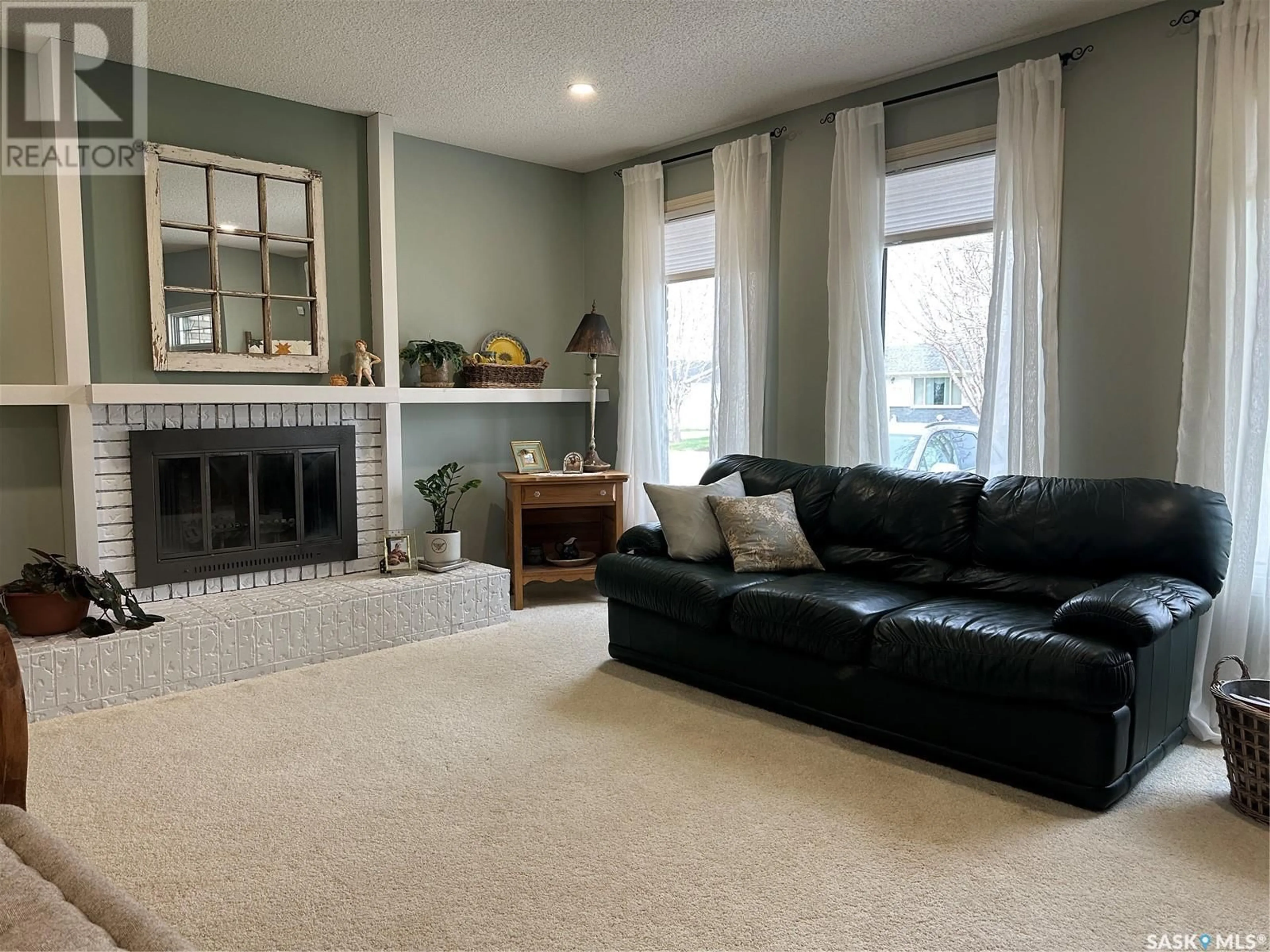 Living room with furniture, unknown for 612 STAVELEY CRESCENT, Weyburn Saskatchewan S4H2T6