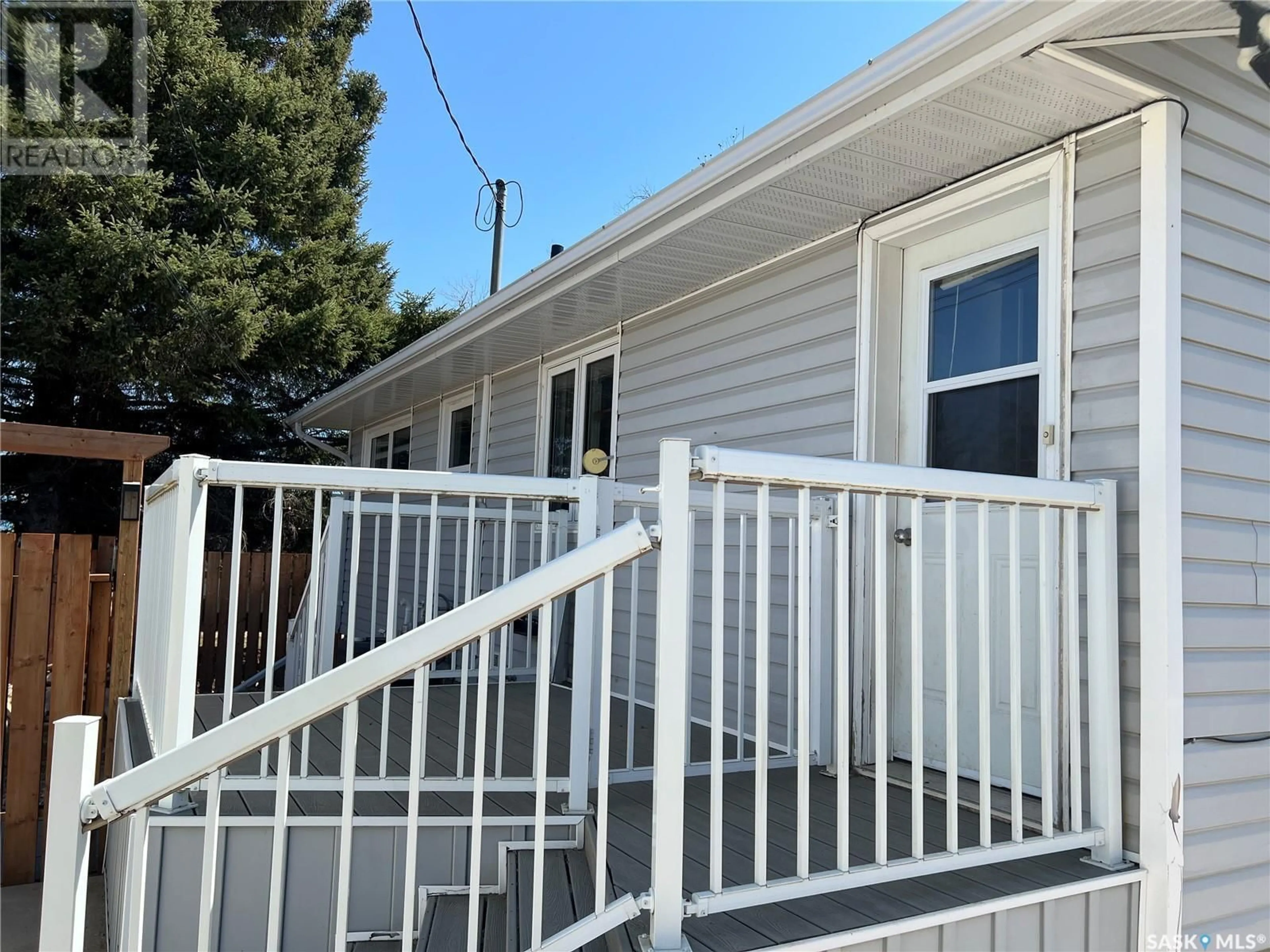 Home with vinyl exterior material, street for 220 ELM STREET, Porcupine Plain Saskatchewan S0E1H0