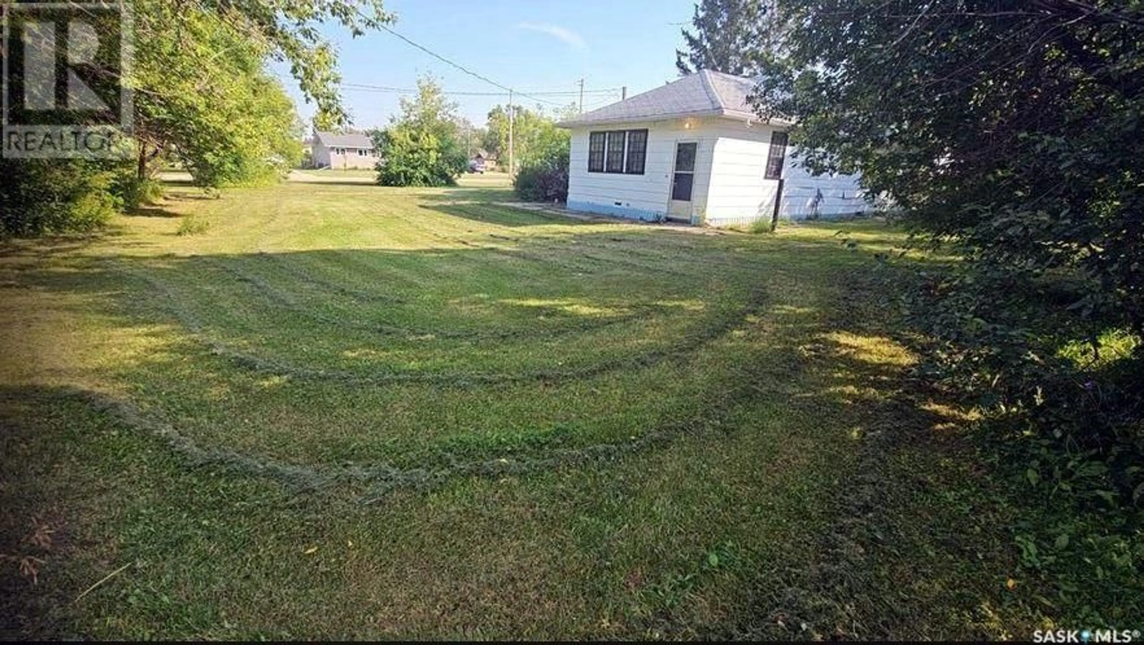 A pic from outside/outdoor area/front of a property/back of a property/a pic from drone, street for 218-220 3RD AVENUE, Kelvington Saskatchewan S0A1W0