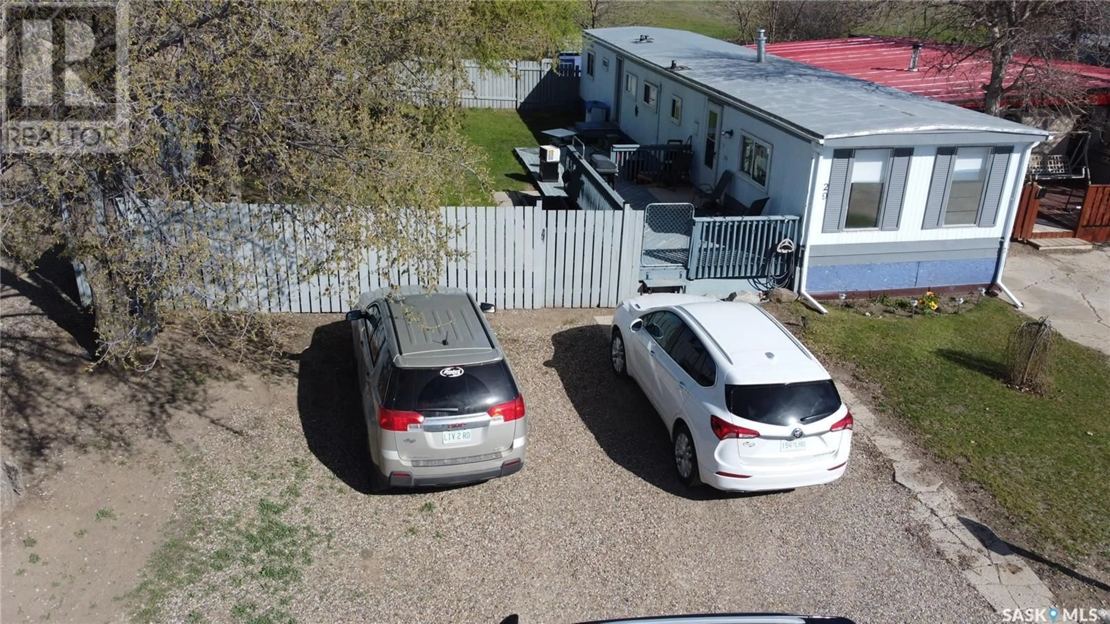 A pic from outside/outdoor area/front of a property/back of a property/a pic from drone, street for 29 701 11TH AVENUE NW, Swift Current Saskatchewan S9H4M5