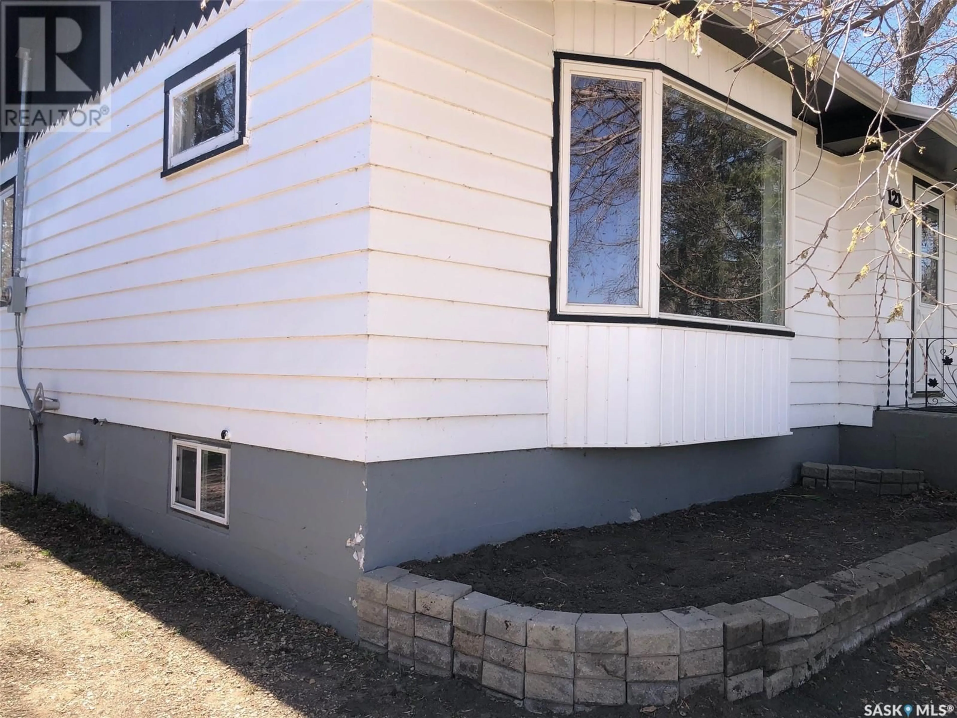Home with vinyl exterior material, street for 121 CHARTER AVENUE, Canora Saskatchewan S0A0L0