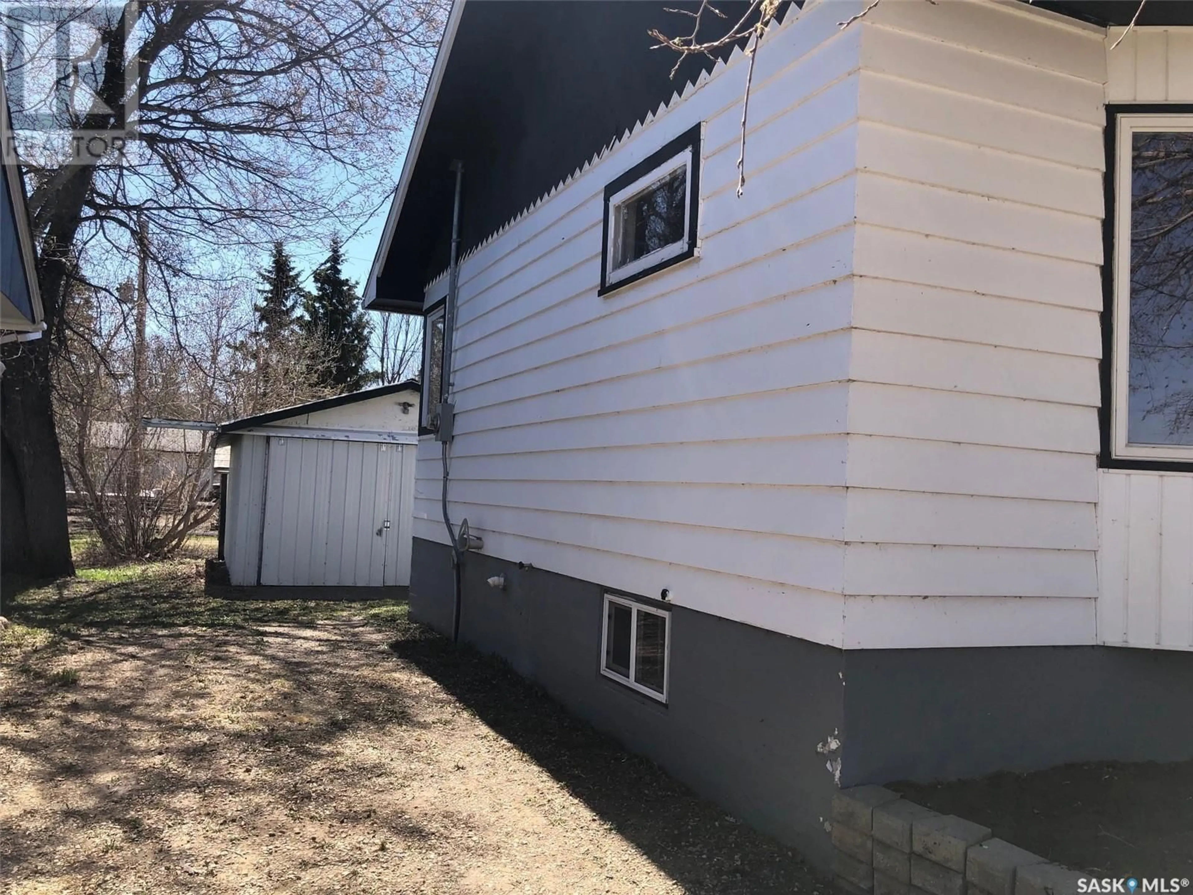 Home with vinyl exterior material, street for 121 CHARTER AVENUE, Canora Saskatchewan S0A0L0