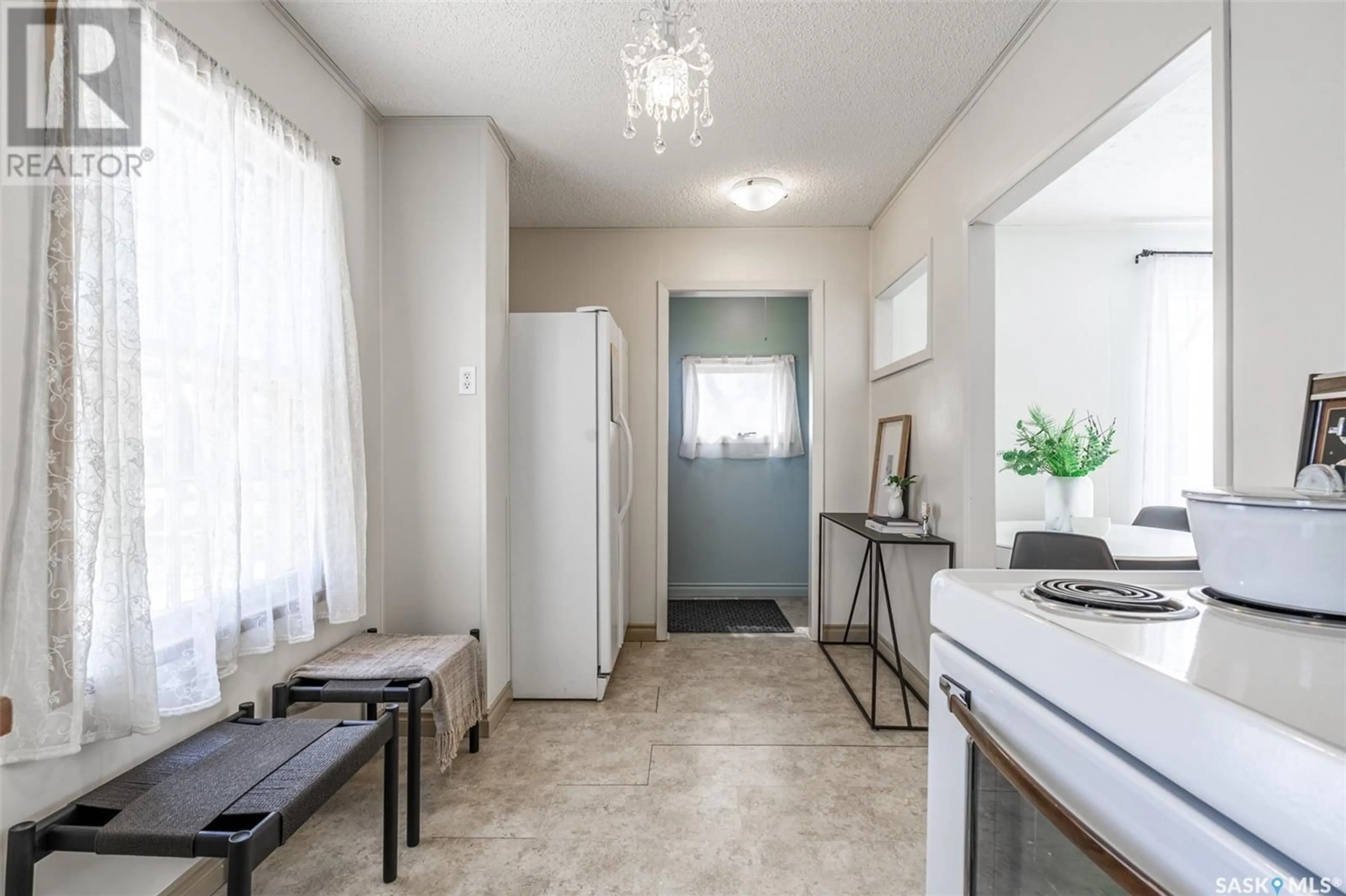 Standard kitchen, ceramic/tile floor for 217 ASH STREET, Saskatoon Saskatchewan S7J0J9