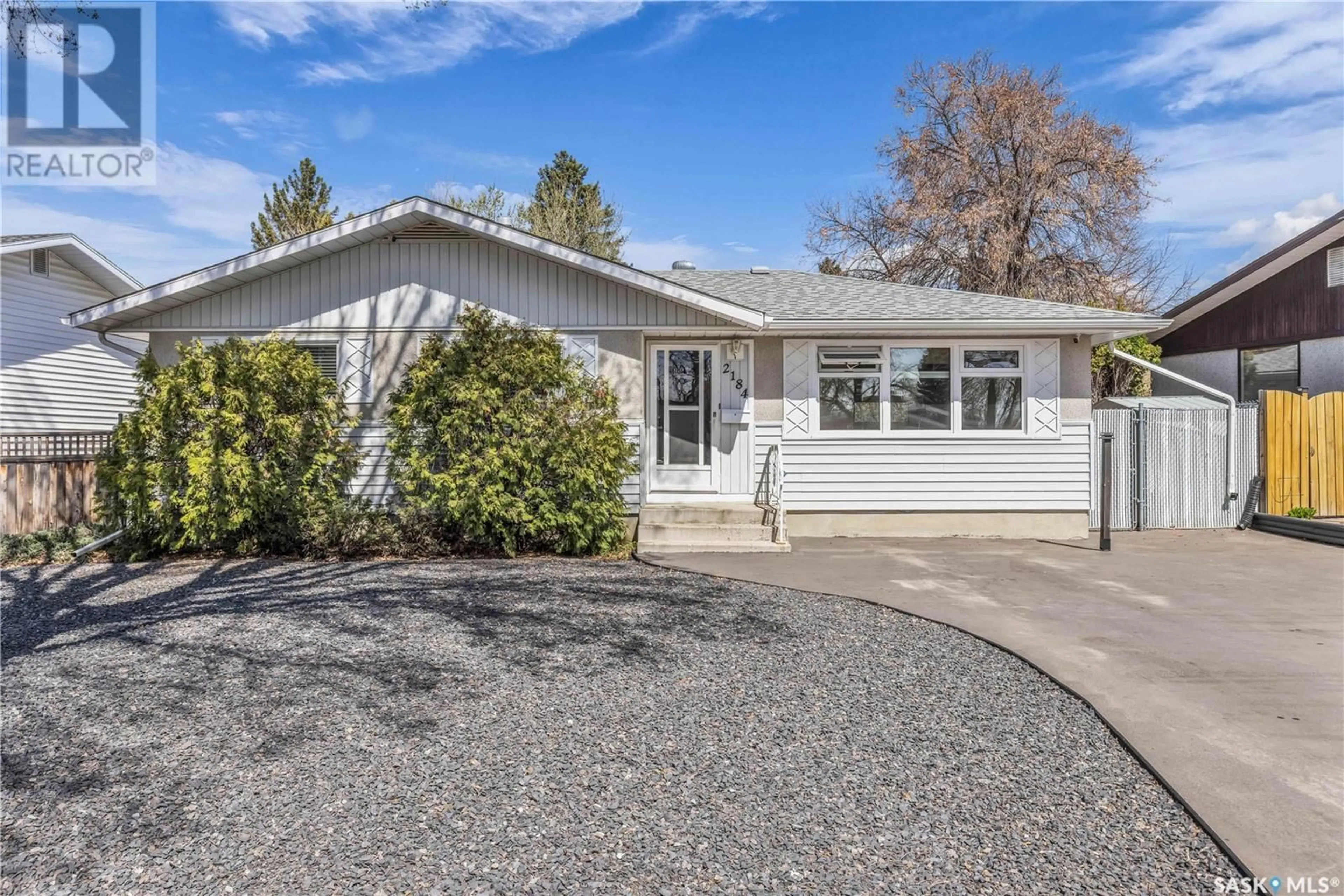Home with vinyl exterior material, street for 2184 EASTHILL, Saskatoon Saskatchewan S7J3C9