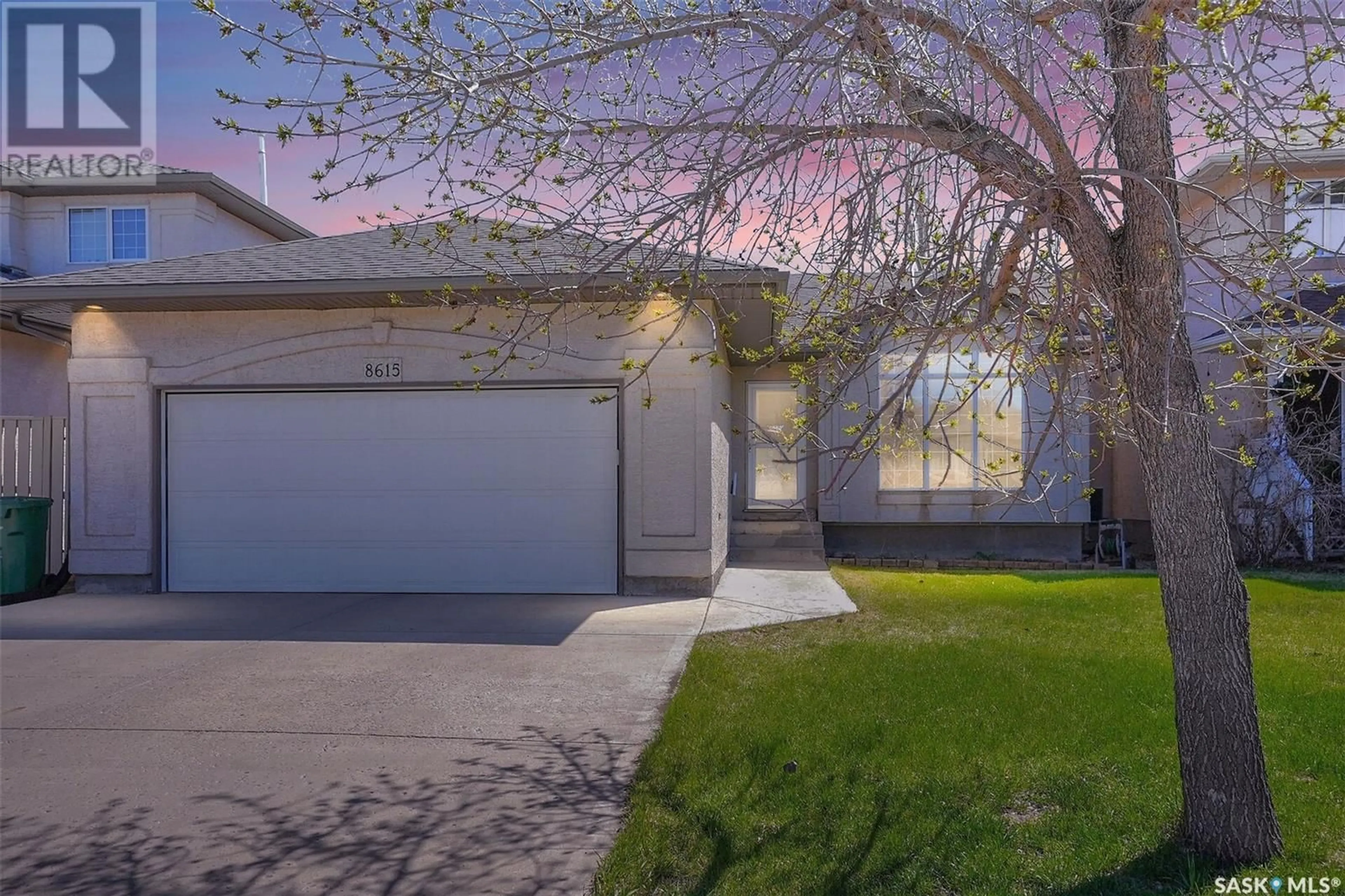 Home with vinyl exterior material, street for 8615 SHERWOOD DRIVE, Regina Saskatchewan S4Y1A5