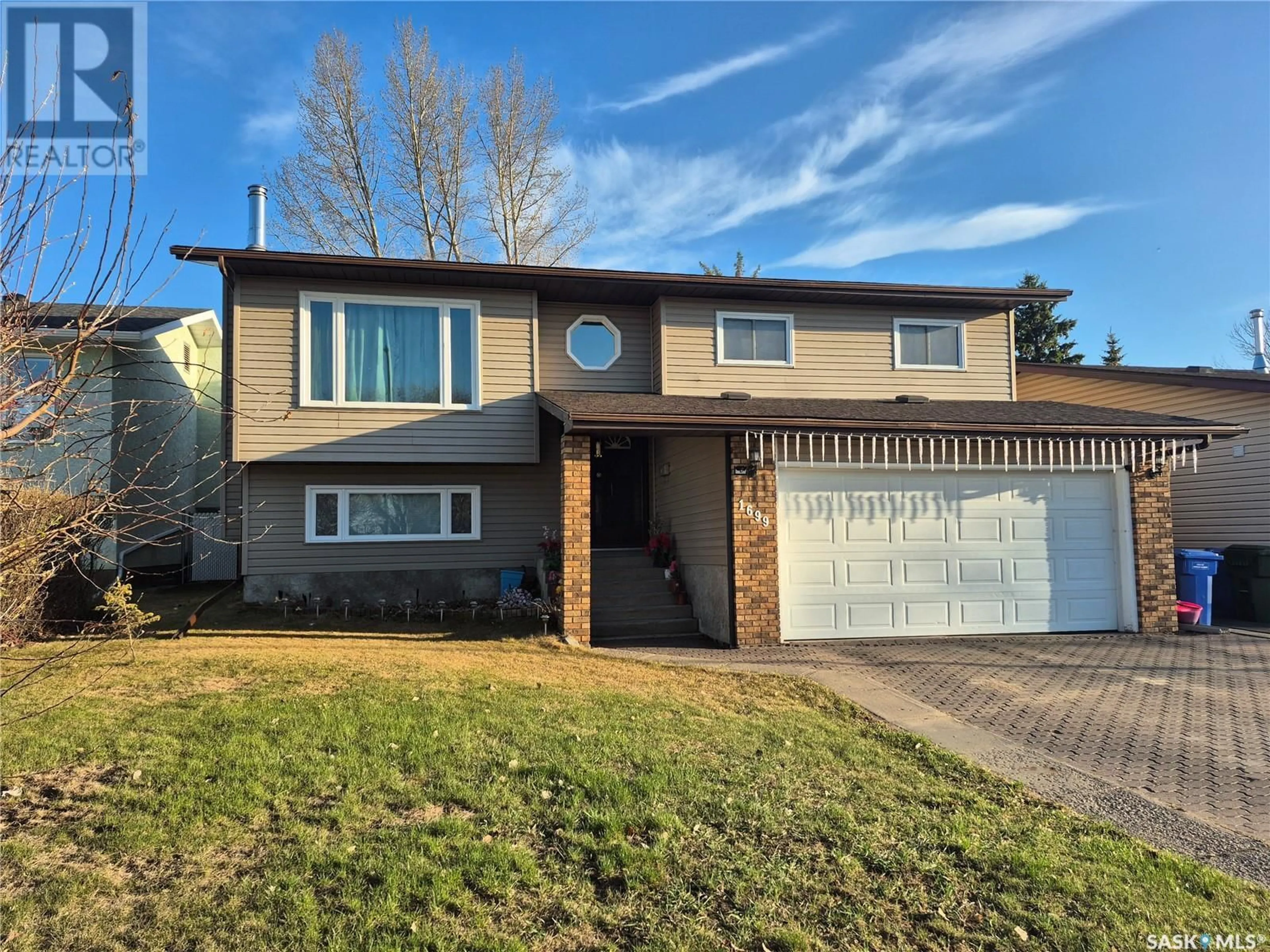 Home with vinyl exterior material, street for 1699 ALLBRIGHT CRESCENT, Prince Albert Saskatchewan S6V7C3