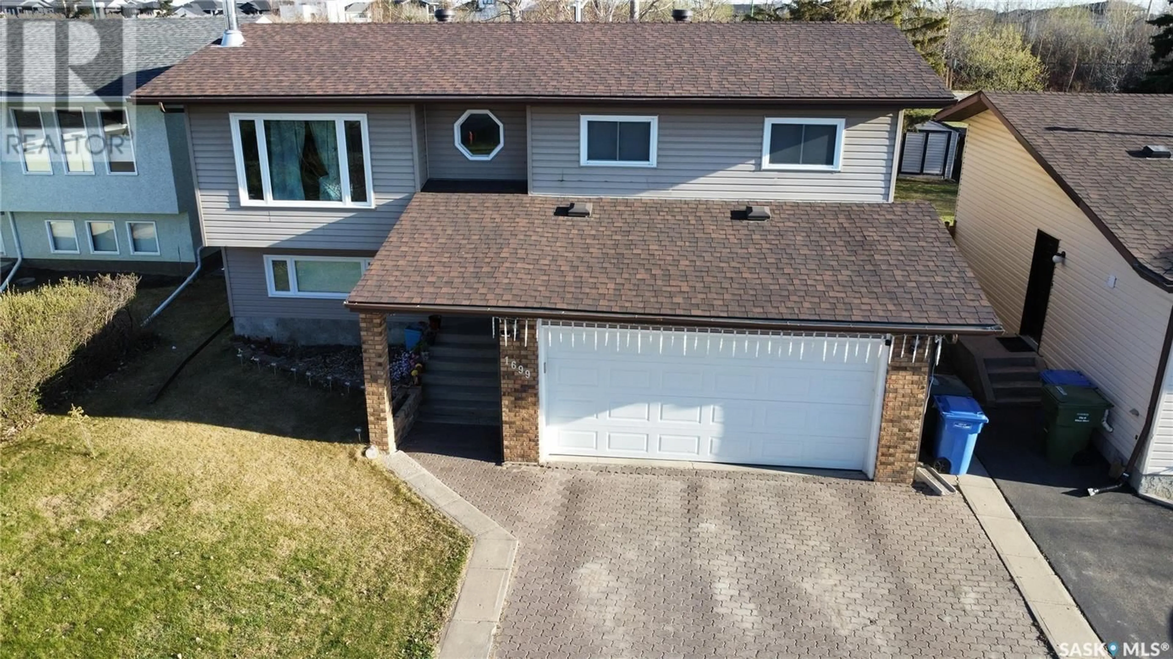 A pic from outside/outdoor area/front of a property/back of a property/a pic from drone, street for 1699 ALLBRIGHT CRESCENT, Prince Albert Saskatchewan S6V7C3