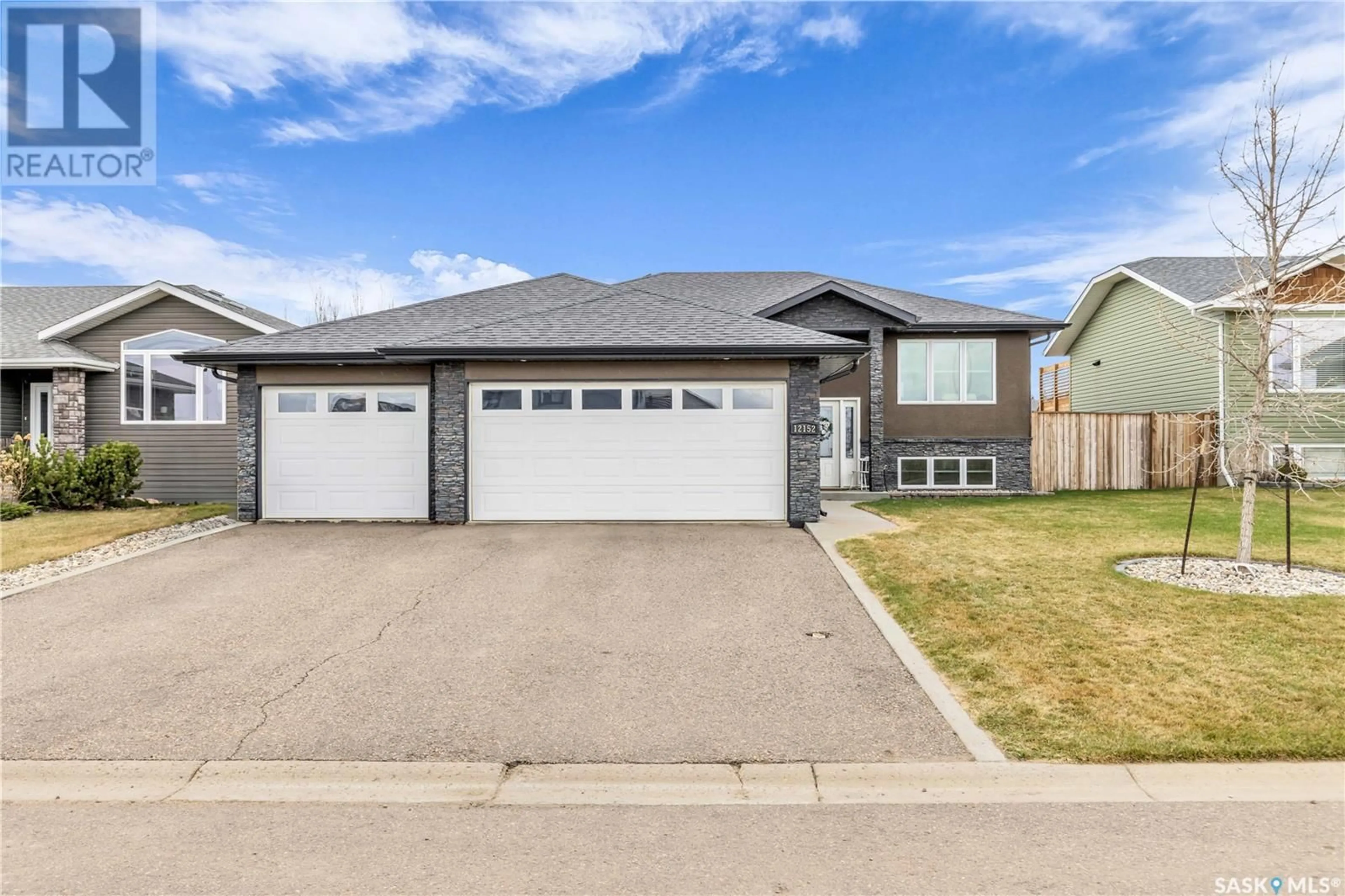 Home with vinyl exterior material, street for 12152 BATTLE SPRINGS DRIVE, Battleford Saskatchewan S0M0E0