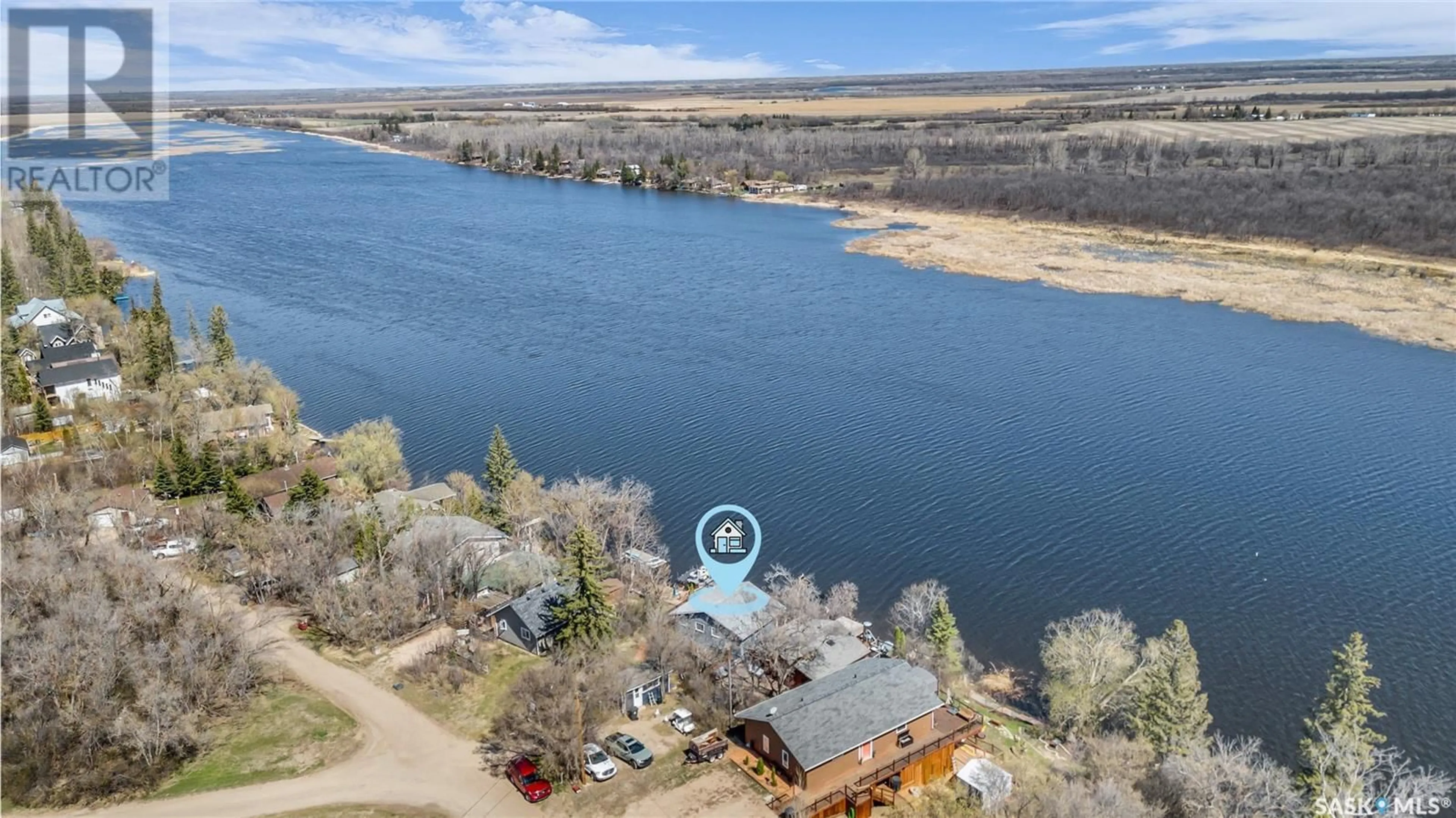 A pic from outside/outdoor area/front of a property/back of a property/a pic from drone, water/lake/river/ocean view for 37 PARK AVENUE, Pike Lake Saskatchewan S0L3L0