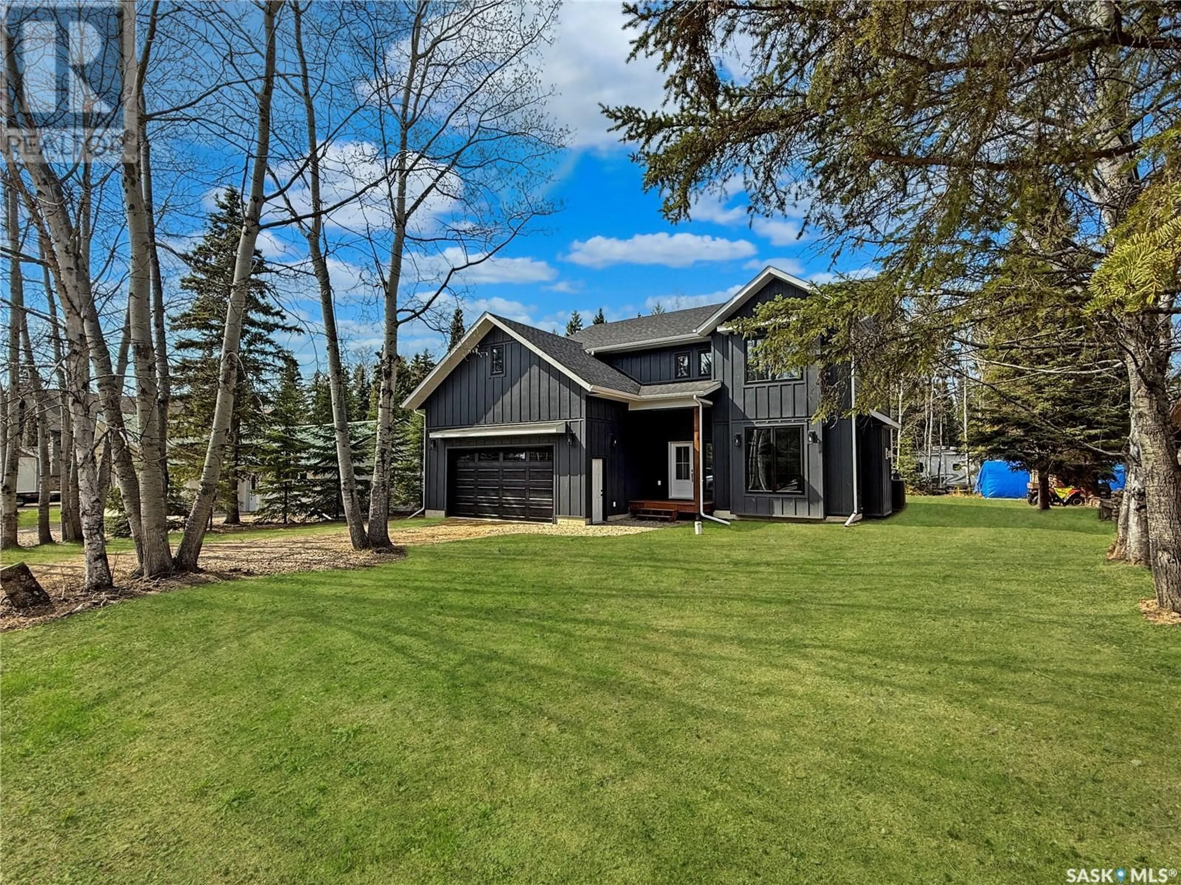 A pic from outside/outdoor area/front of a property/back of a property/a pic from drone, unknown for 4 HARNISH PLACE, Candle Lake Saskatchewan S0J3E0