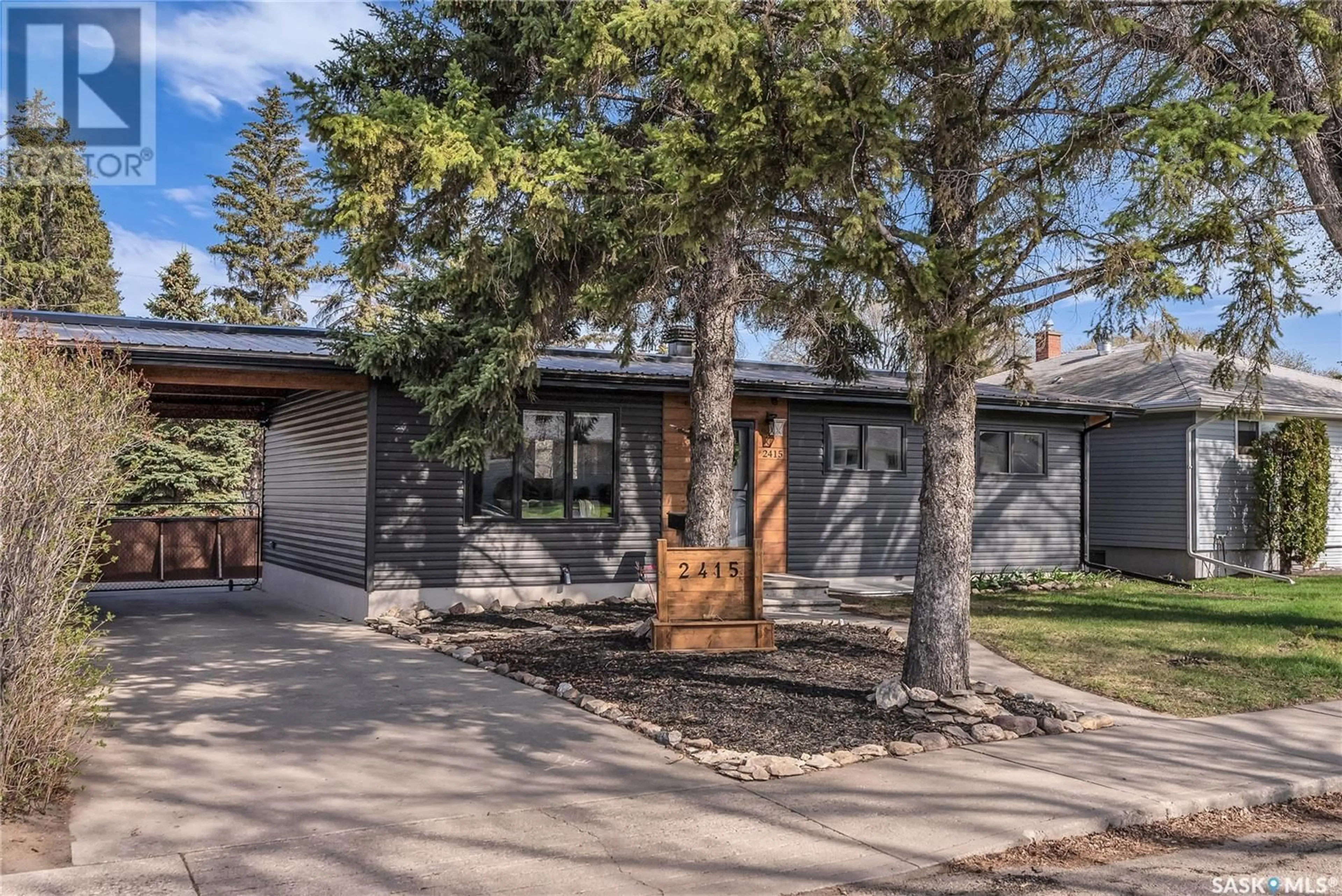 Home with brick exterior material, street for 2415 BLAIN AVENUE, Saskatoon Saskatchewan S7J2B7