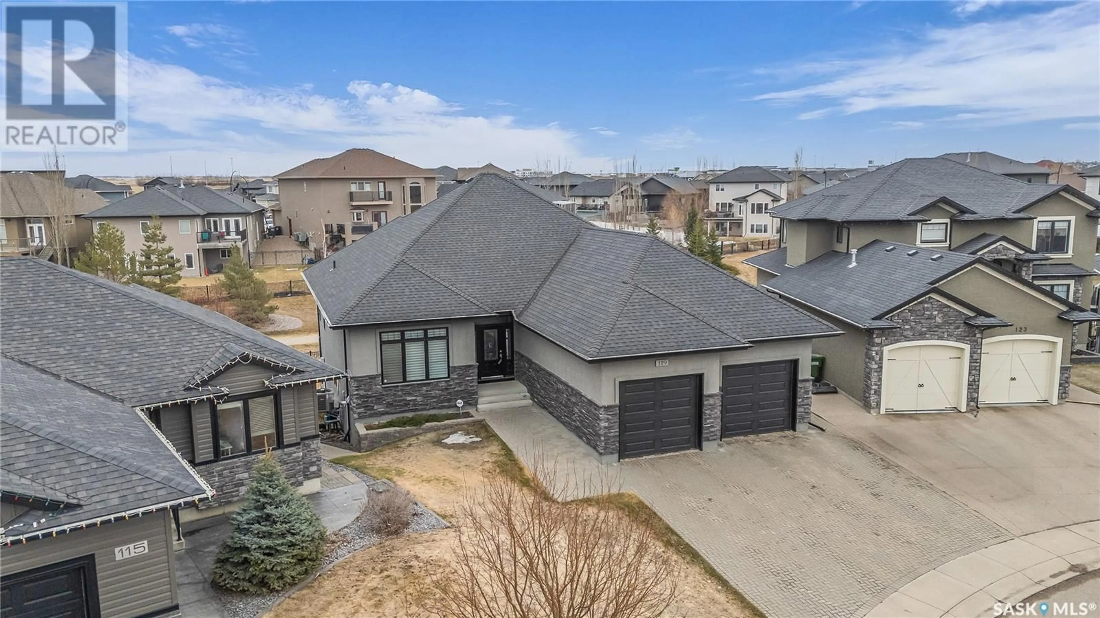 A pic from outside/outdoor area/front of a property/back of a property/a pic from drone, street for 119 FLEMING CRESCENT, Saskatoon Saskatchewan S7W1B4