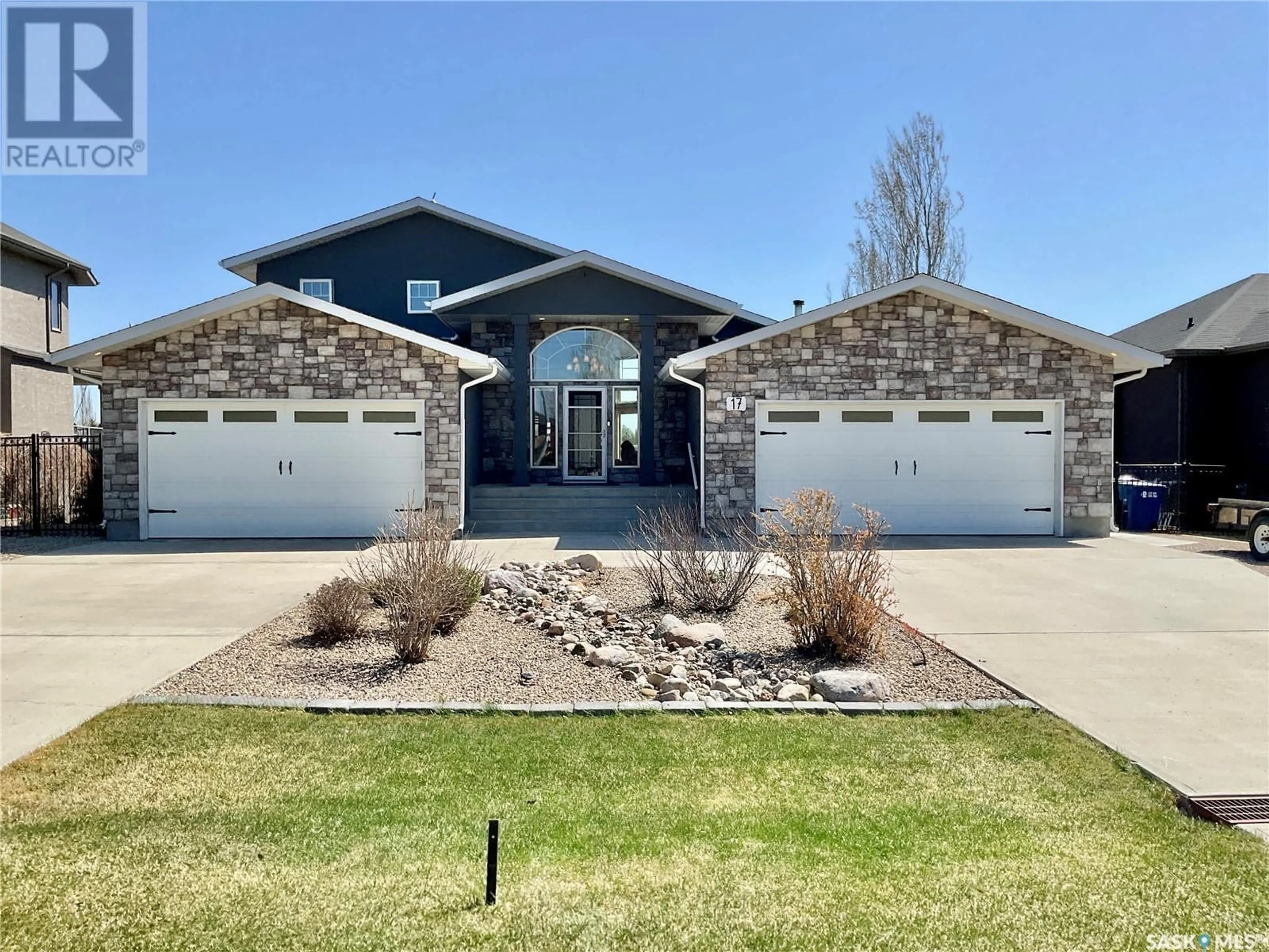 Home with brick exterior material, street for 17 EMERALD CREEK ROAD, White City Saskatchewan S4L0B1