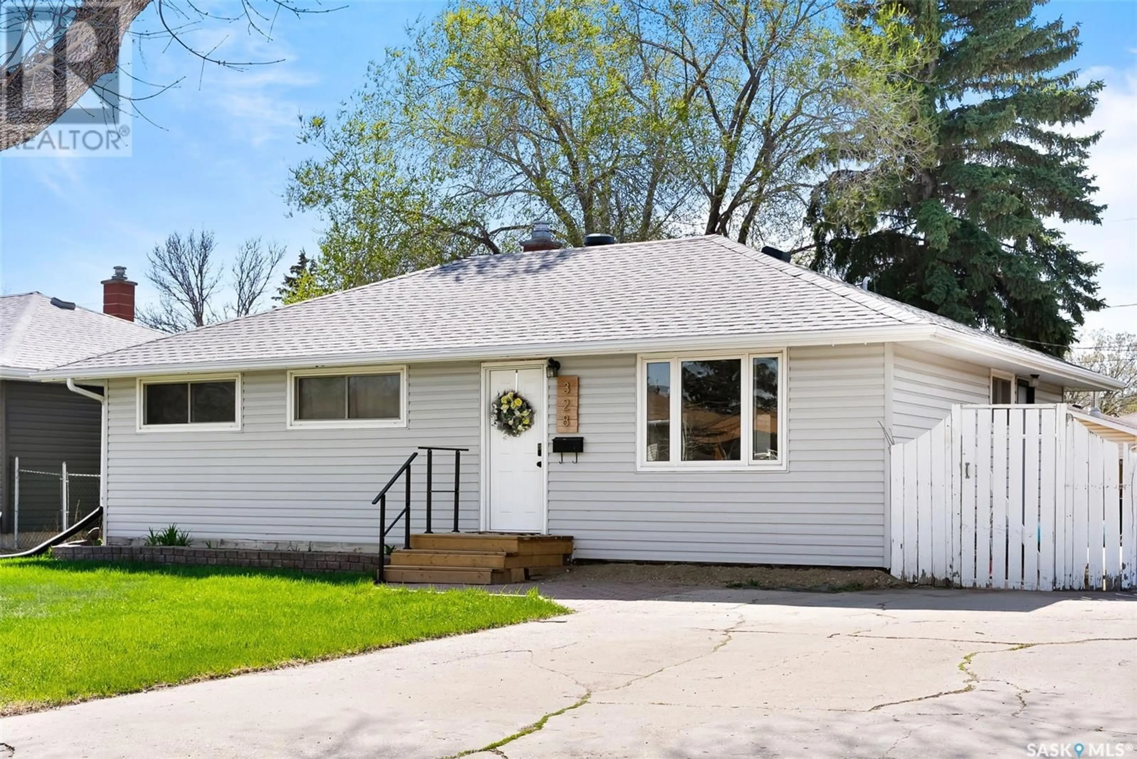 Home with vinyl exterior material, street for 328 ROYAL STREET, Regina Saskatchewan S4R4Y4