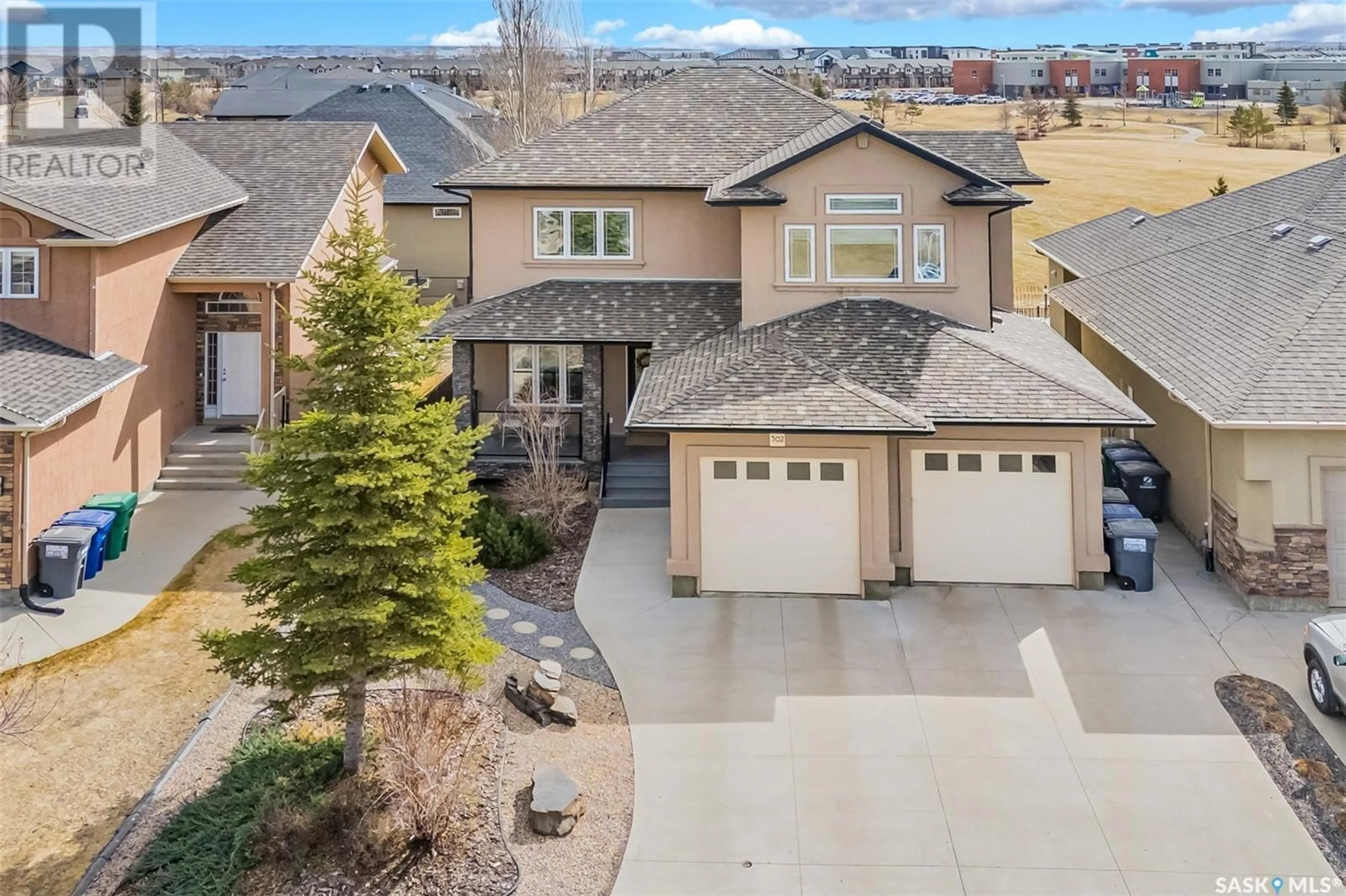 A pic from outside/outdoor area/front of a property/back of a property/a pic from drone, unknown for 362 THODE AVENUE, Saskatoon Saskatchewan S7W1B9