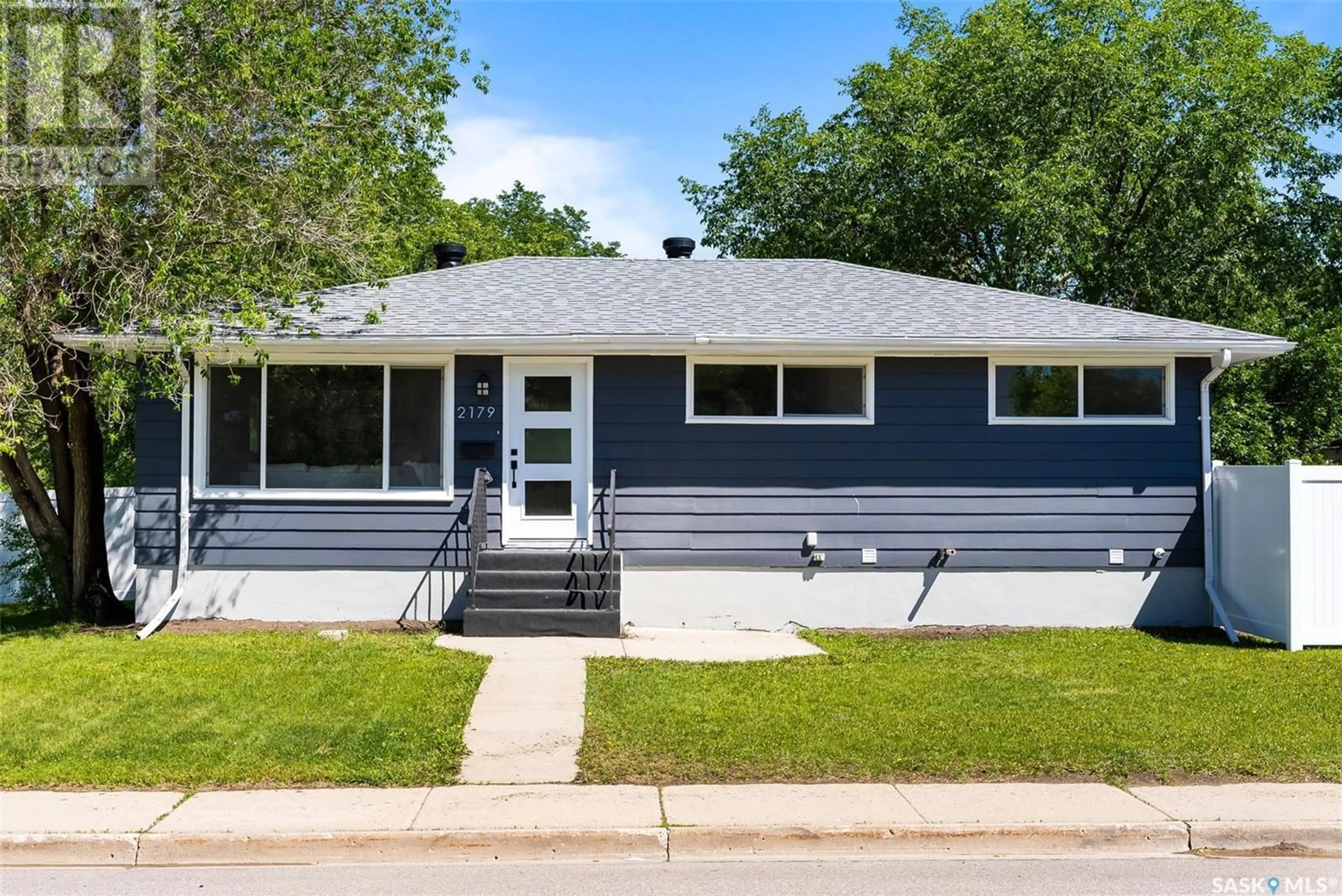 Home with vinyl exterior material, street for 2179 PASQUA STREET, Regina Saskatchewan S4T4M3