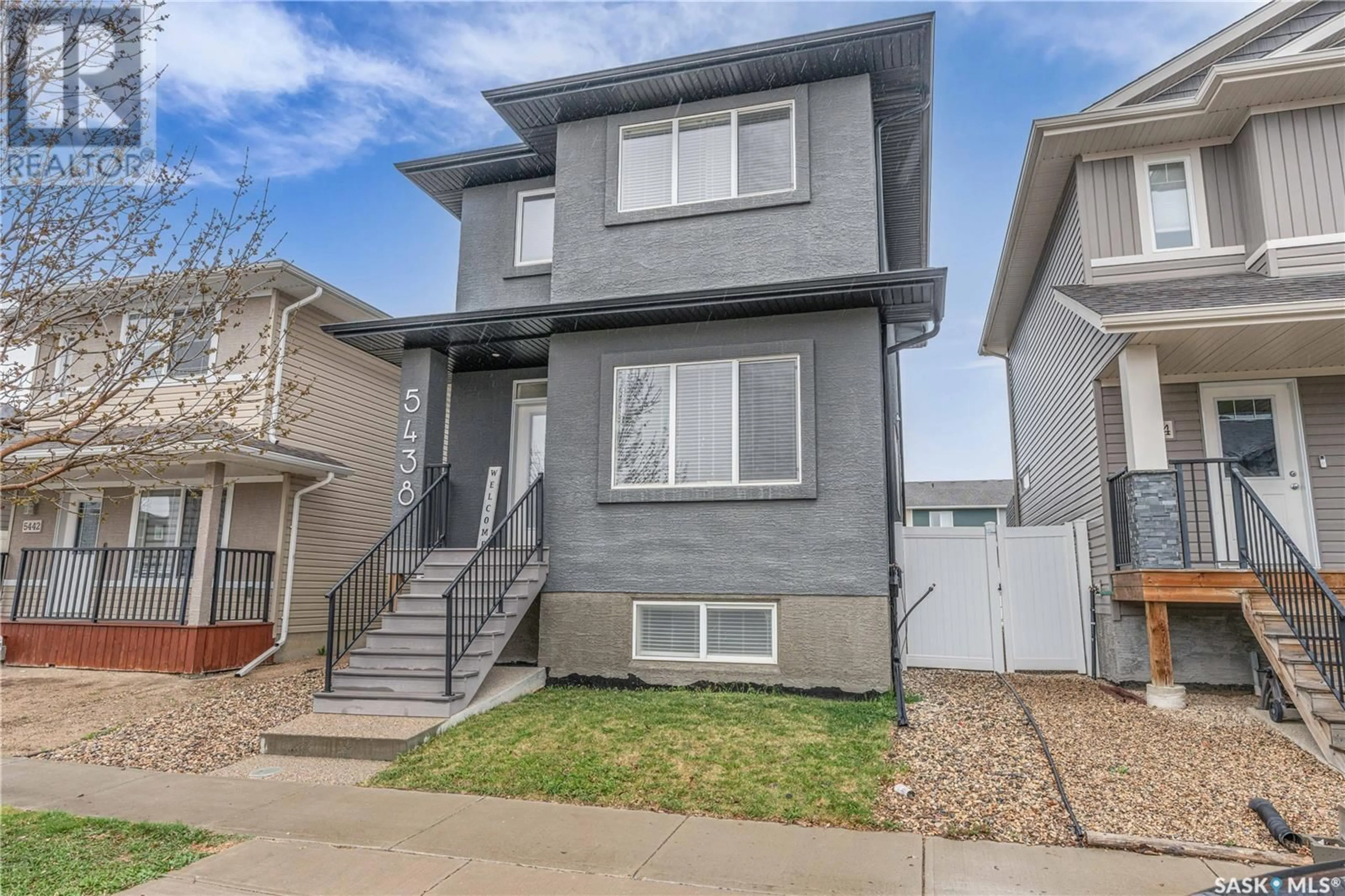 Home with vinyl exterior material, street for 5438 MCCLELLAND DRIVE, Regina Saskatchewan S4W0K8