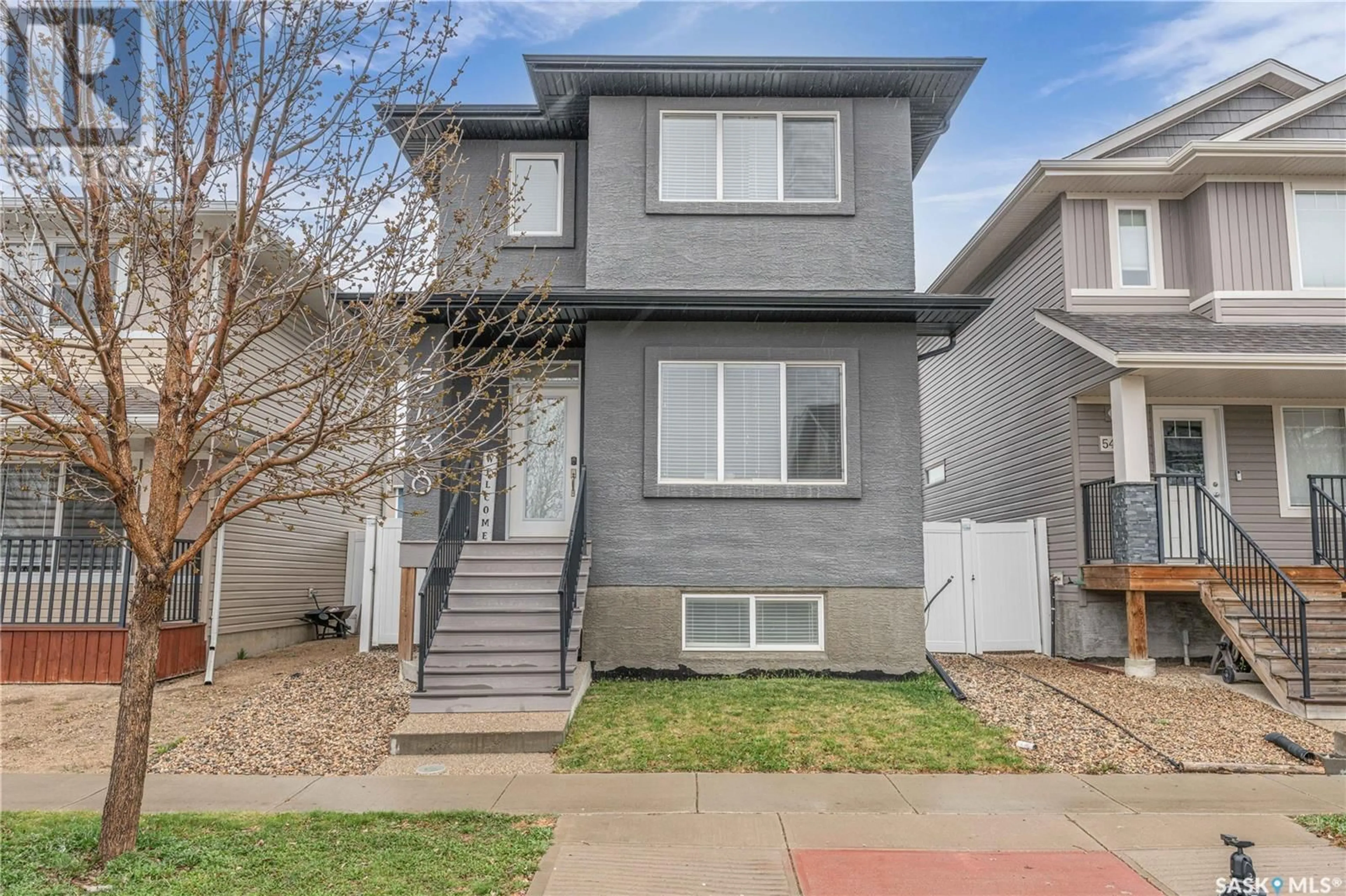 Home with vinyl exterior material, street for 5438 MCCLELLAND DRIVE, Regina Saskatchewan S4W0K8