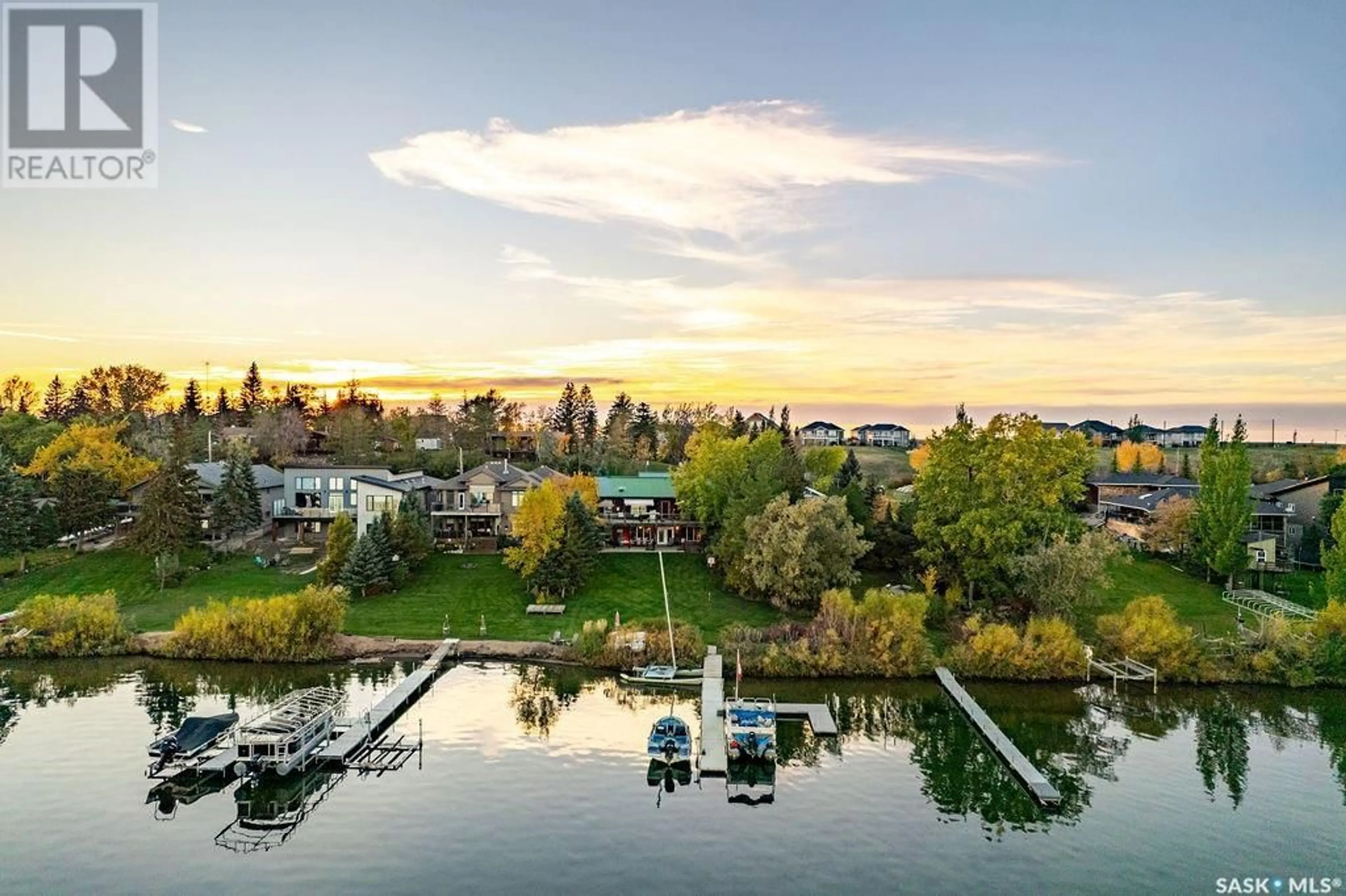 A pic from outside/outdoor area/front of a property/back of a property/a pic from drone, water/lake/river/ocean view for 23 PROCTER DRIVE, Blackstrap Shields Saskatchewan S7C0A1