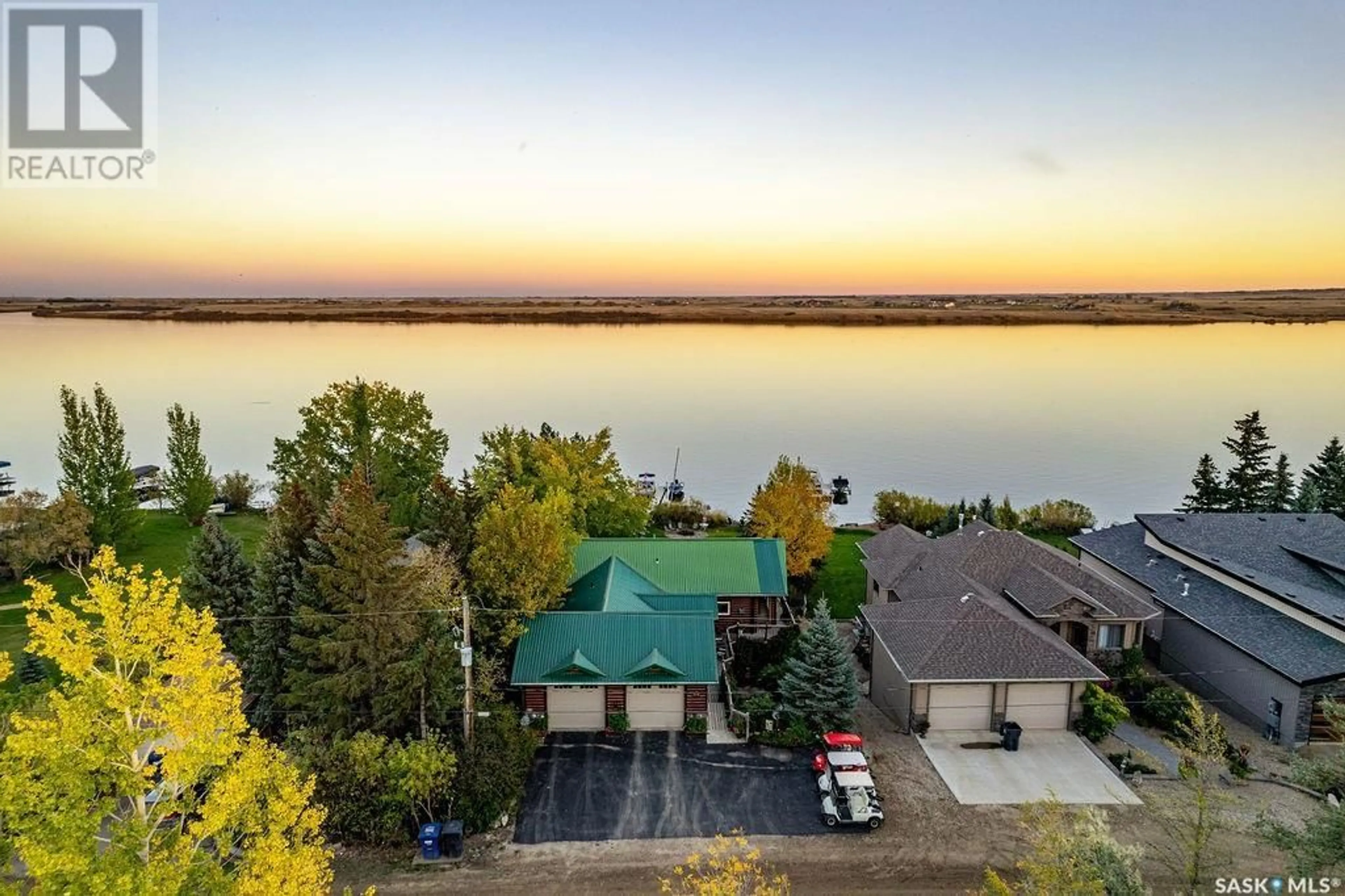 A pic from outside/outdoor area/front of a property/back of a property/a pic from drone, water/lake/river/ocean view for 23 PROCTER DRIVE, Blackstrap Shields Saskatchewan S7C0A1