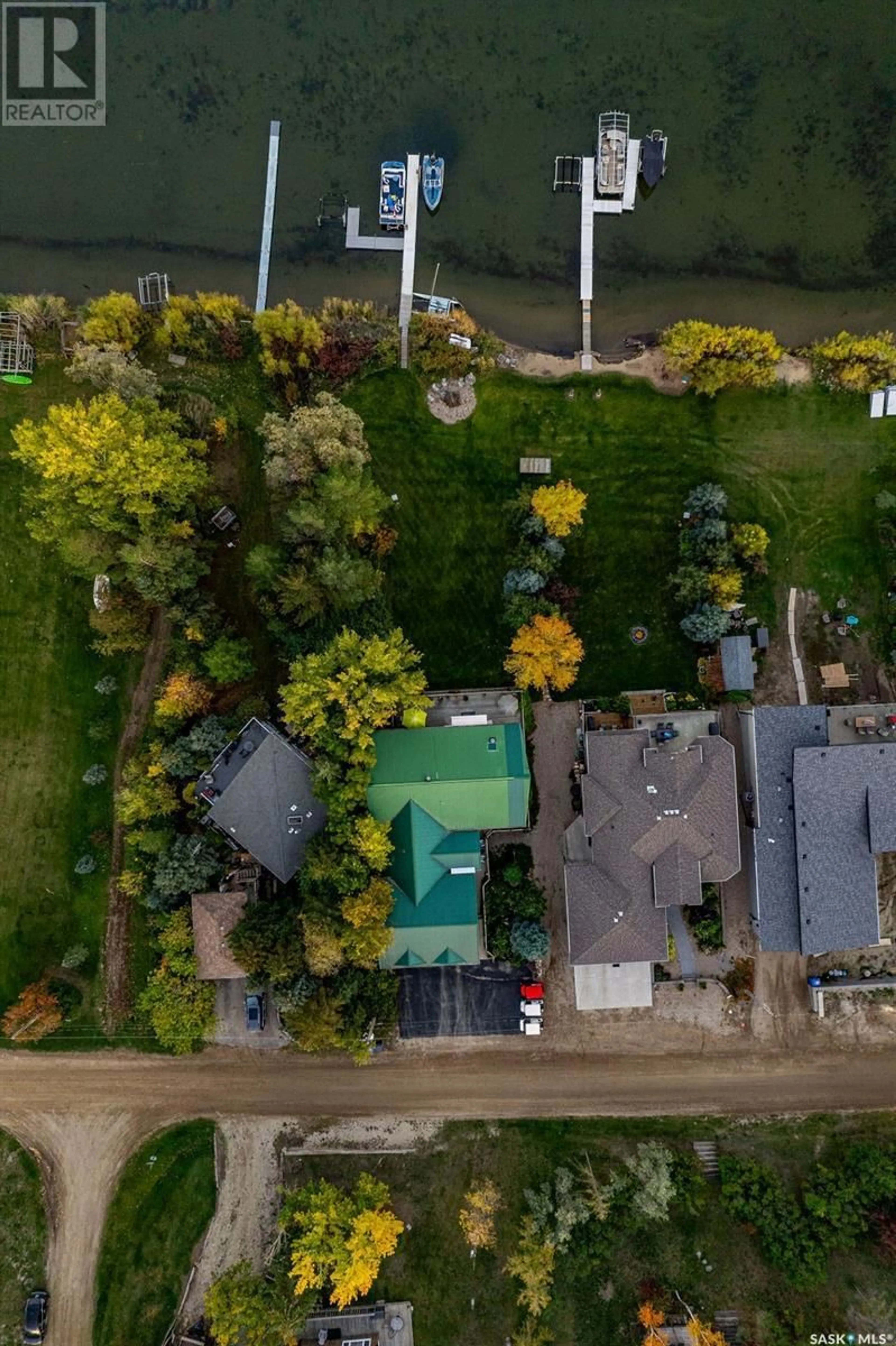 A pic from outside/outdoor area/front of a property/back of a property/a pic from drone, water/lake/river/ocean view for 23 PROCTER DRIVE, Blackstrap Shields Saskatchewan S7C0A1