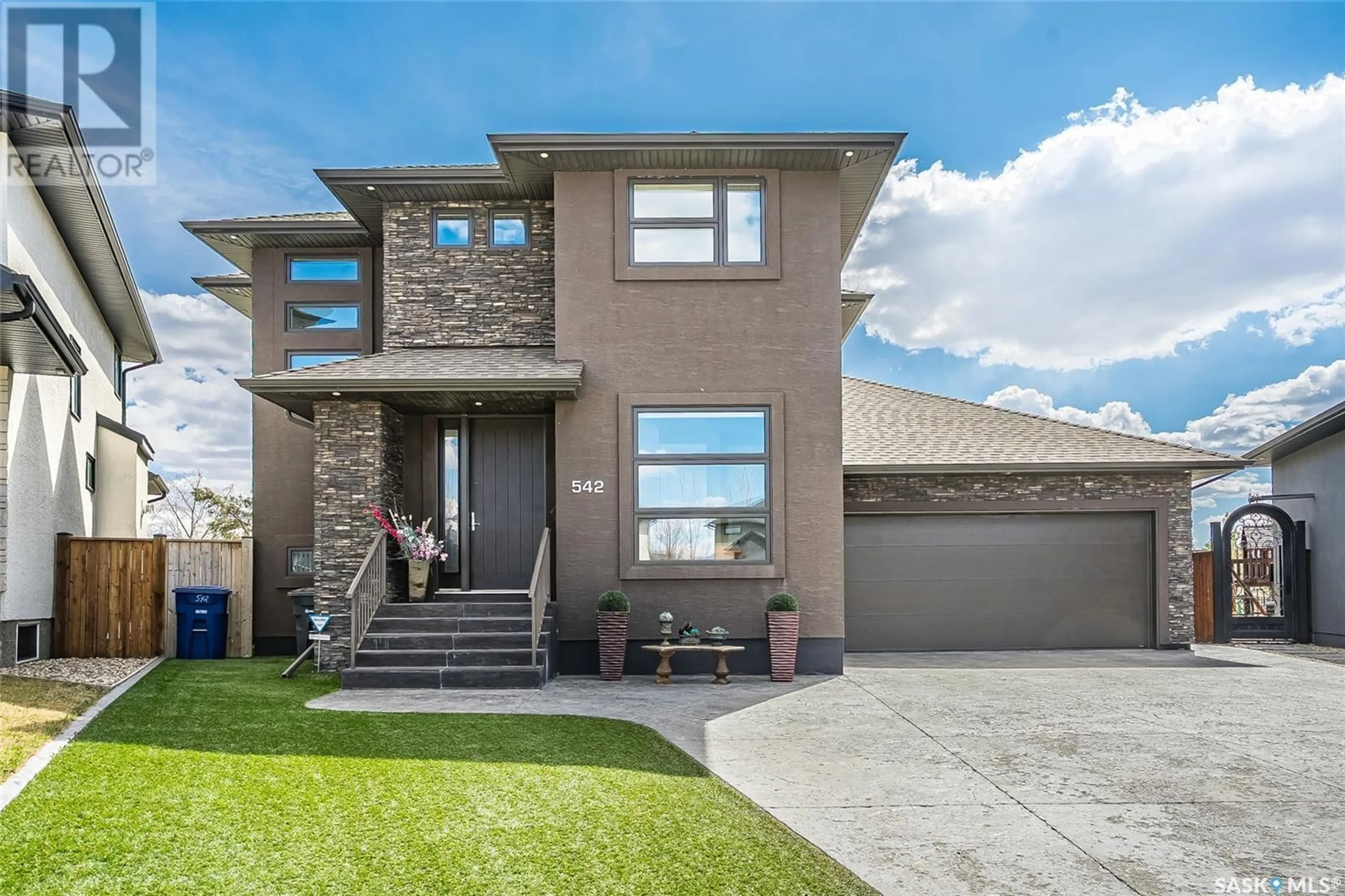 Home with brick exterior material, street for 542 SAUER TERRACE, Saskatoon Saskatchewan S7W0J8
