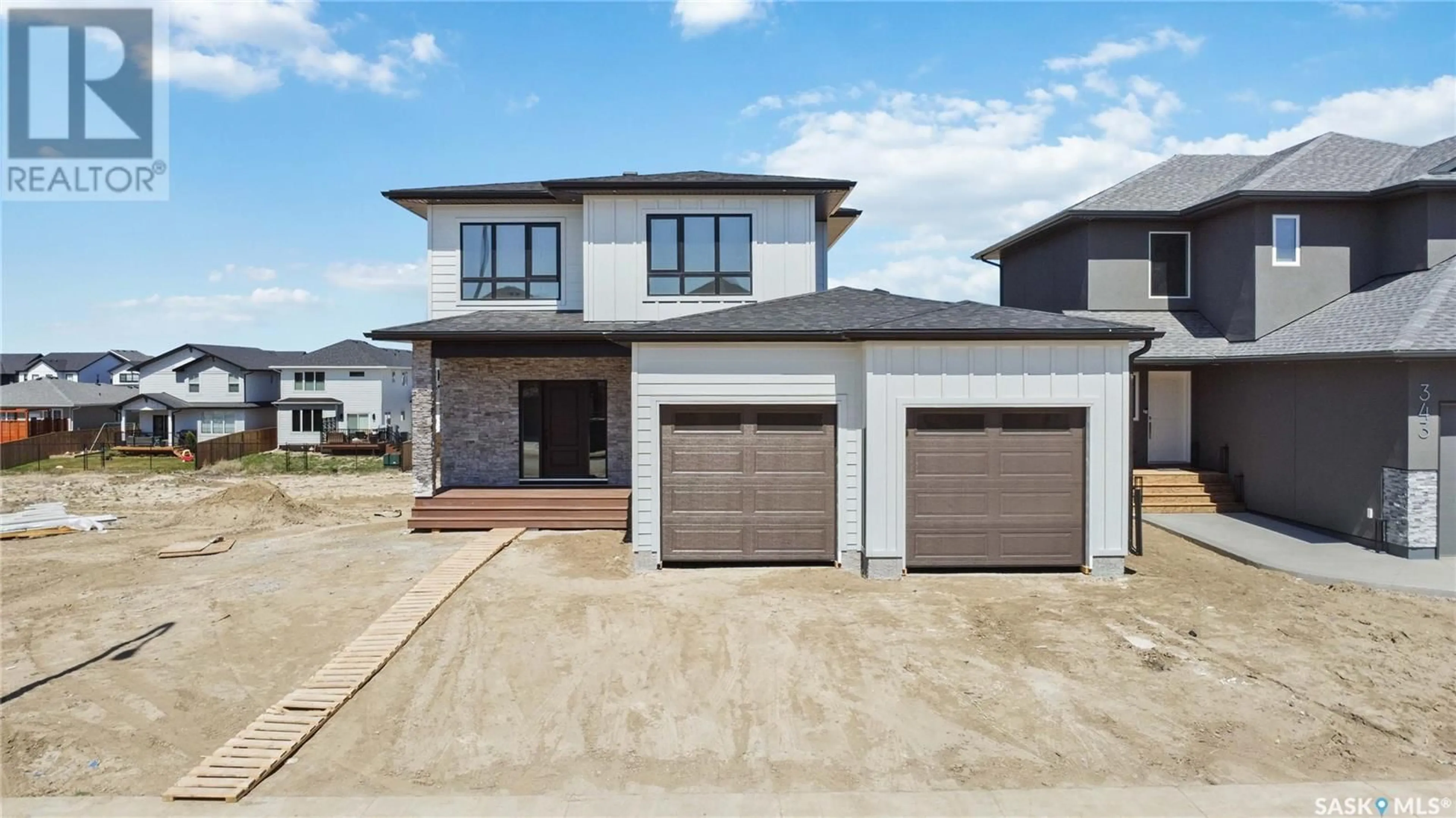 Home with brick exterior material, street for 339 LESKIW BEND, Saskatoon Saskatchewan S7V1X8