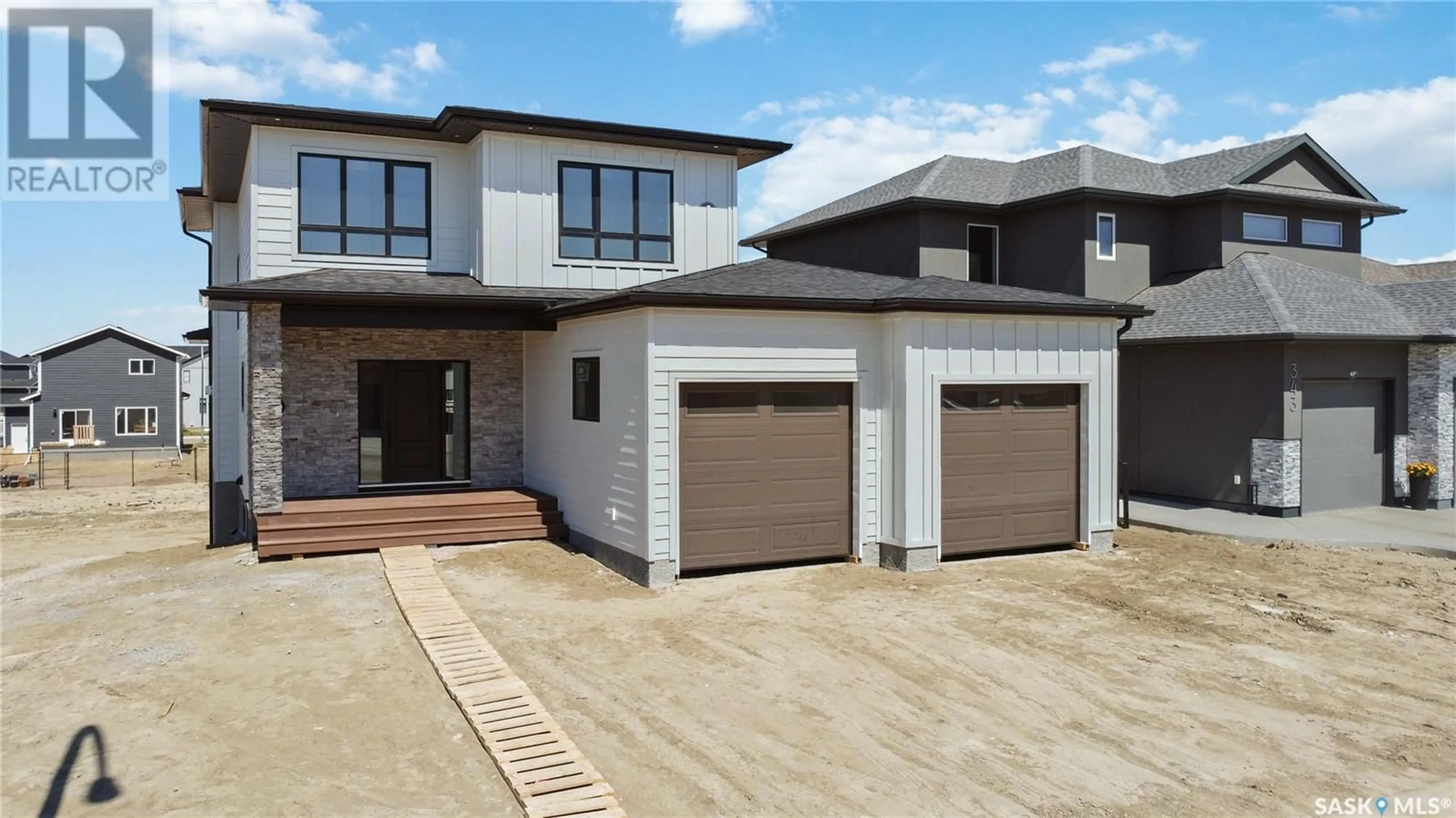 Home with brick exterior material, street for 339 LESKIW BEND, Saskatoon Saskatchewan S7V1X8