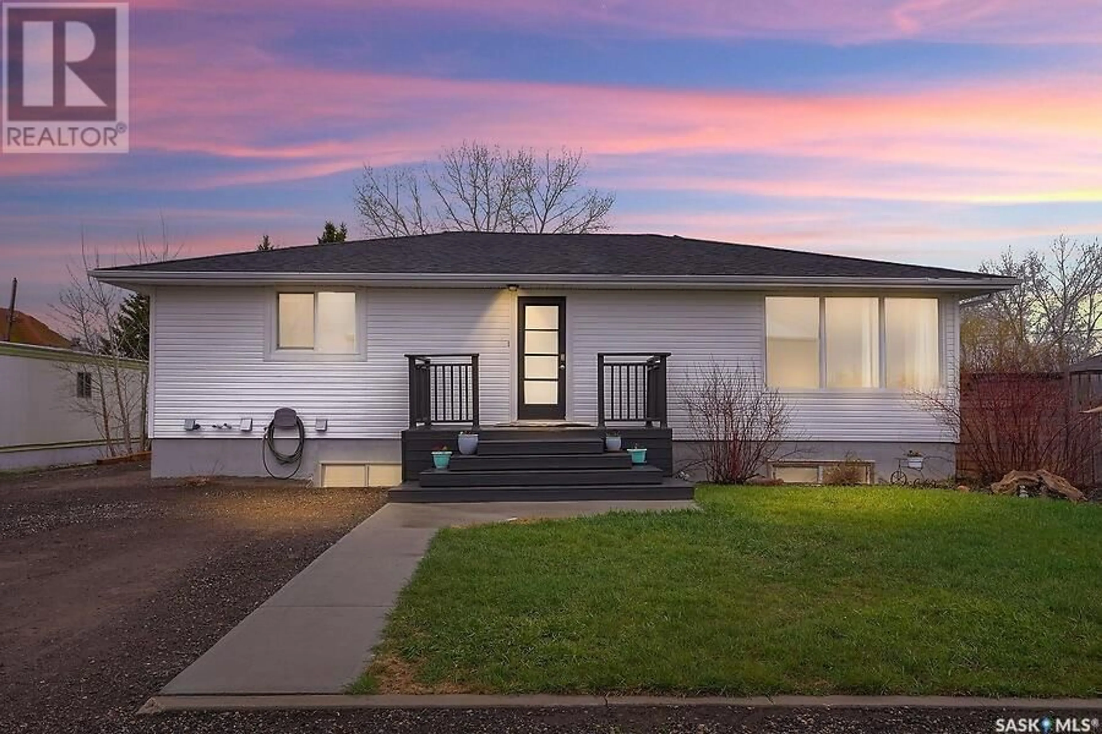 Home with vinyl exterior material, street for 424 BRUNSWICK STREET, Pense Saskatchewan S0G3W0