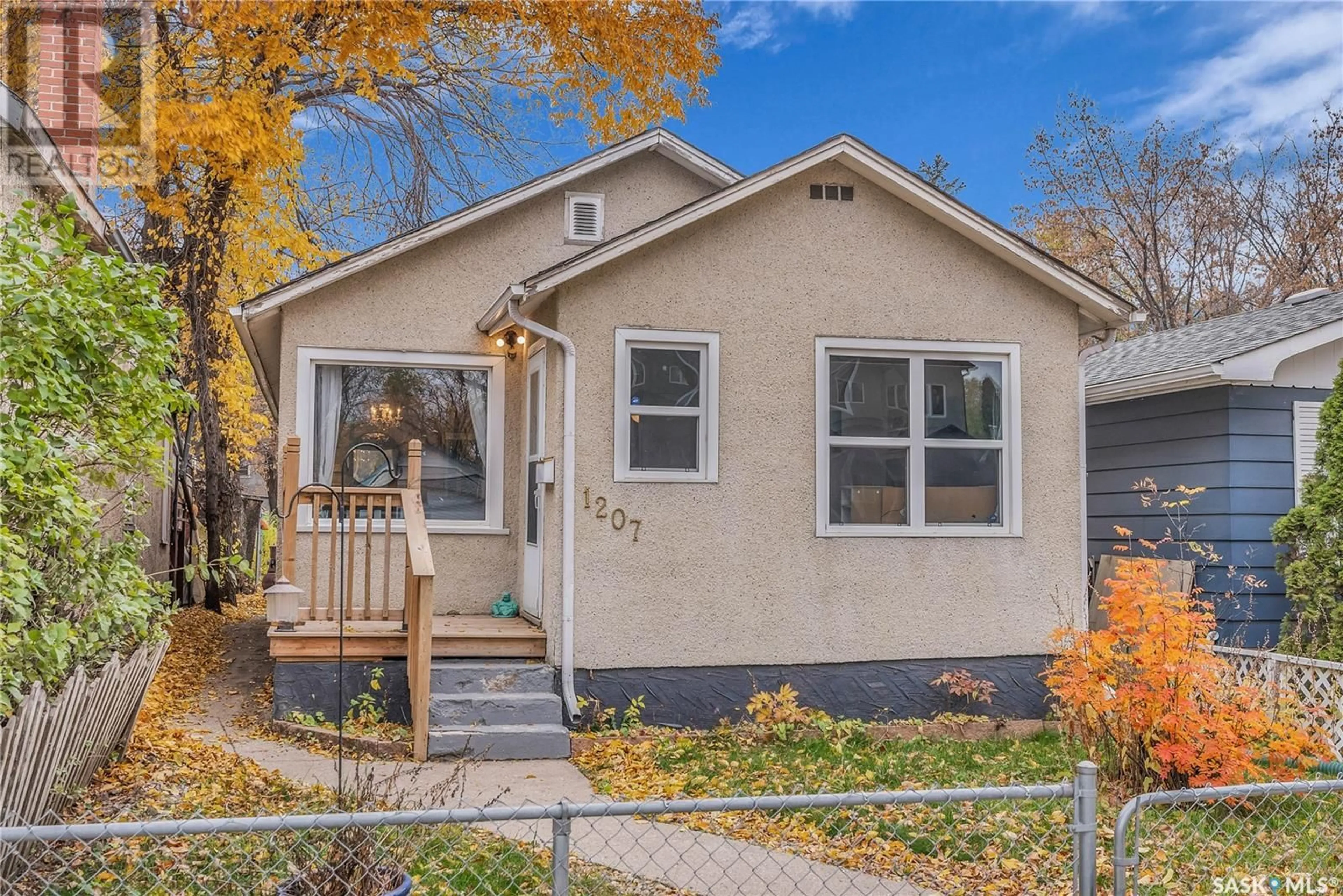 Home with vinyl exterior material, street for 1207 D AVENUE, Saskatoon Saskatchewan S7L1N9