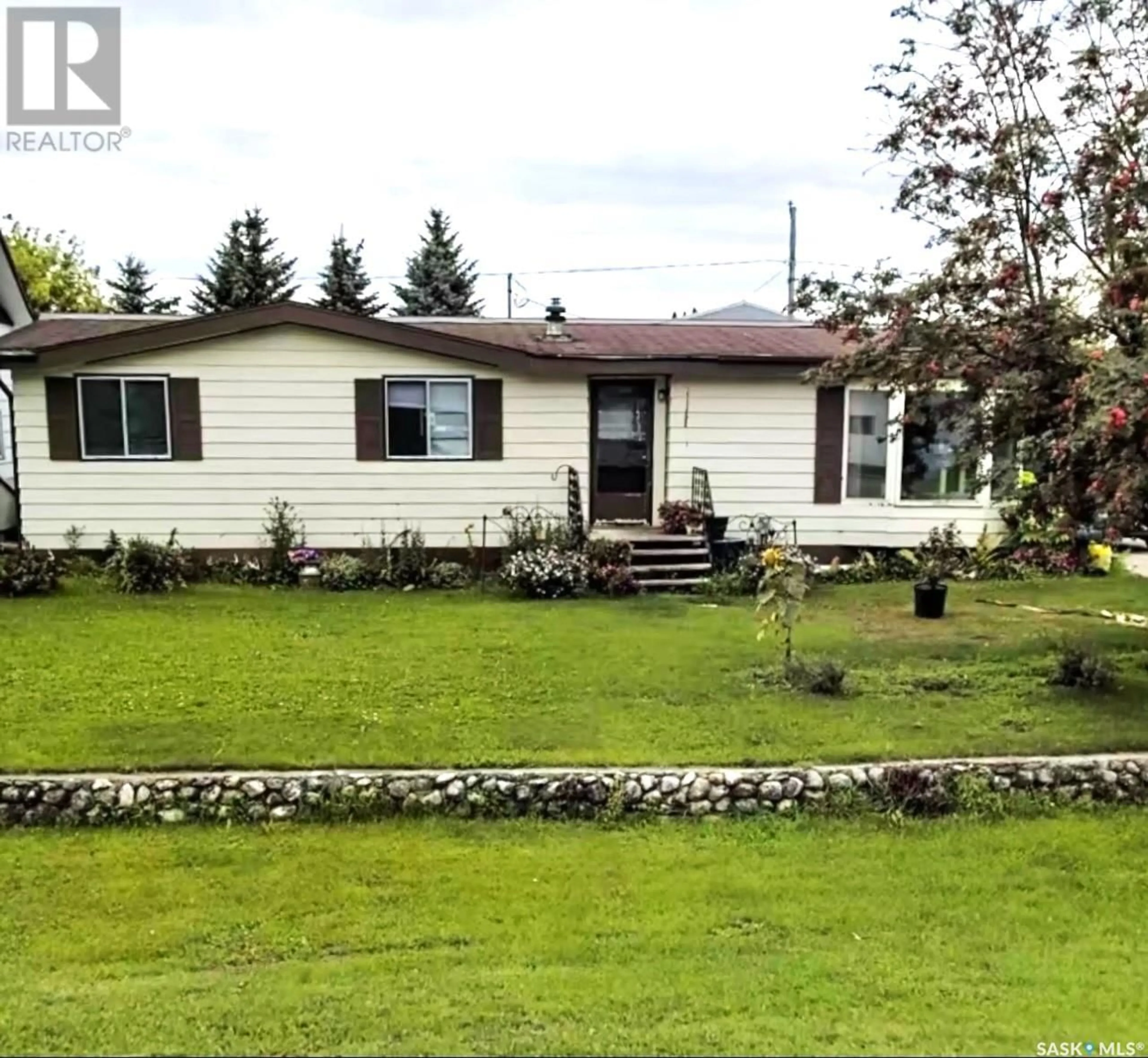 A pic from outside/outdoor area/front of a property/back of a property/a pic from drone, street for 313 HARA AVENUE, Bjorkdale Saskatchewan S0E0Y0
