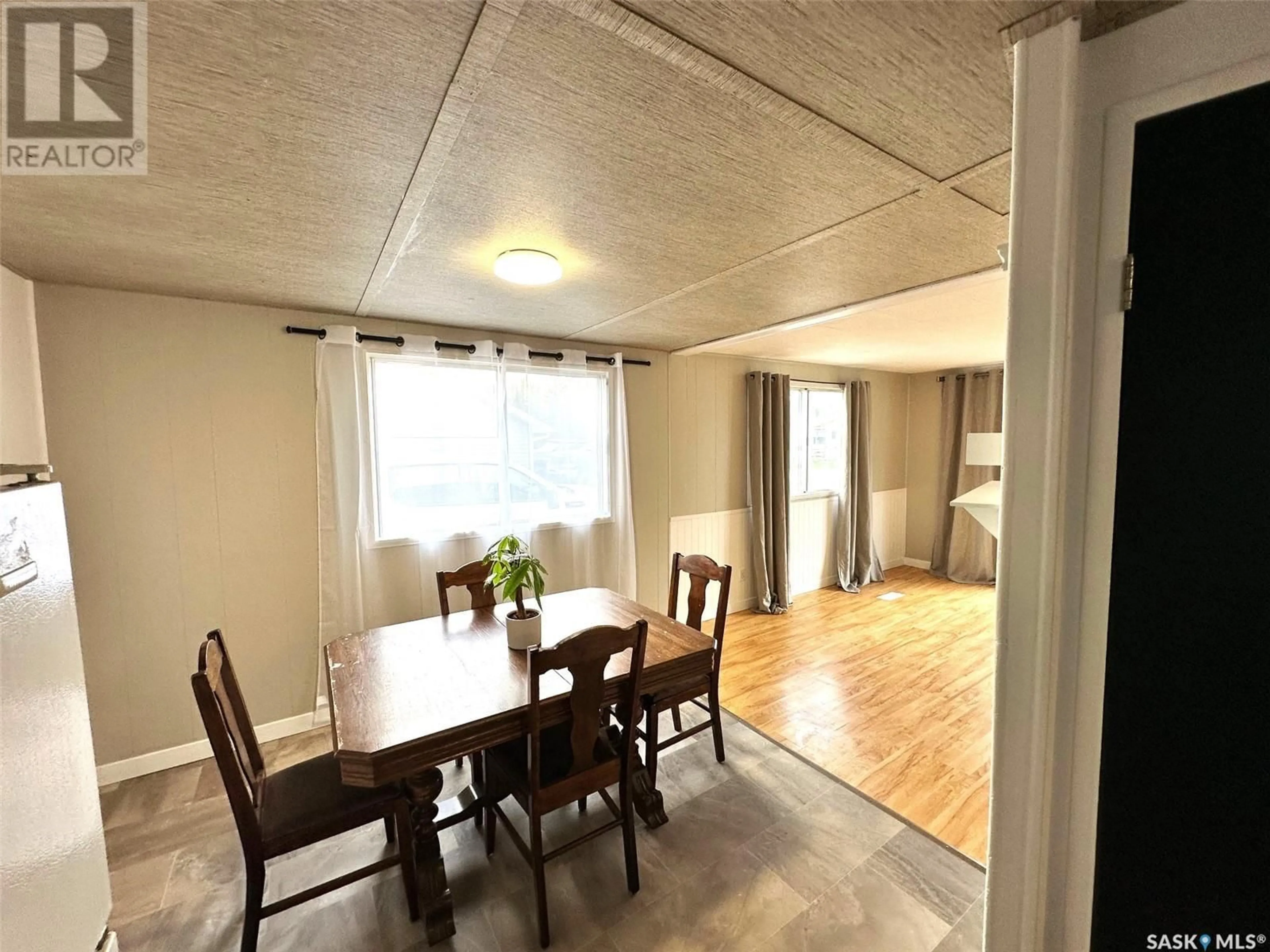 Dining room, wood/laminate floor for 313 HARA AVENUE, Bjorkdale Saskatchewan S0E0Y0