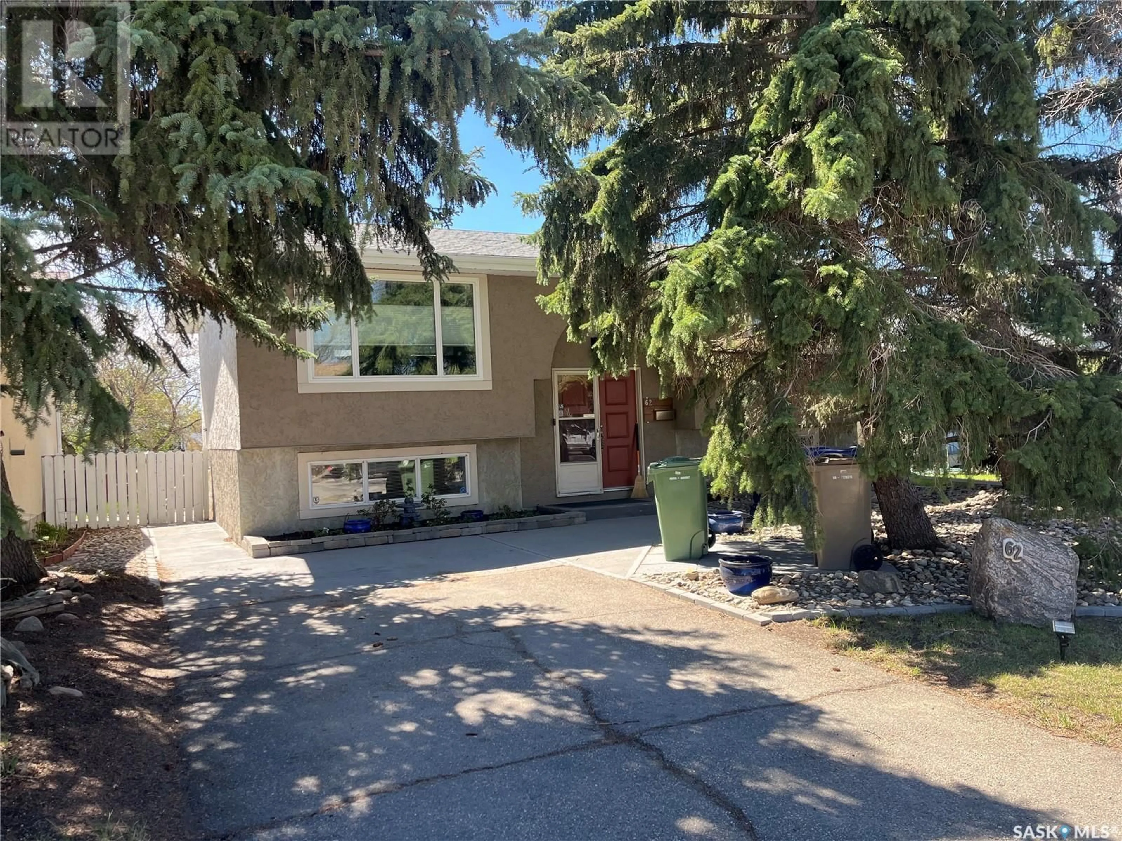 Home with vinyl exterior material, street for 62 MCSHERRY CRESCENT, Regina Saskatchewan S4T7B7