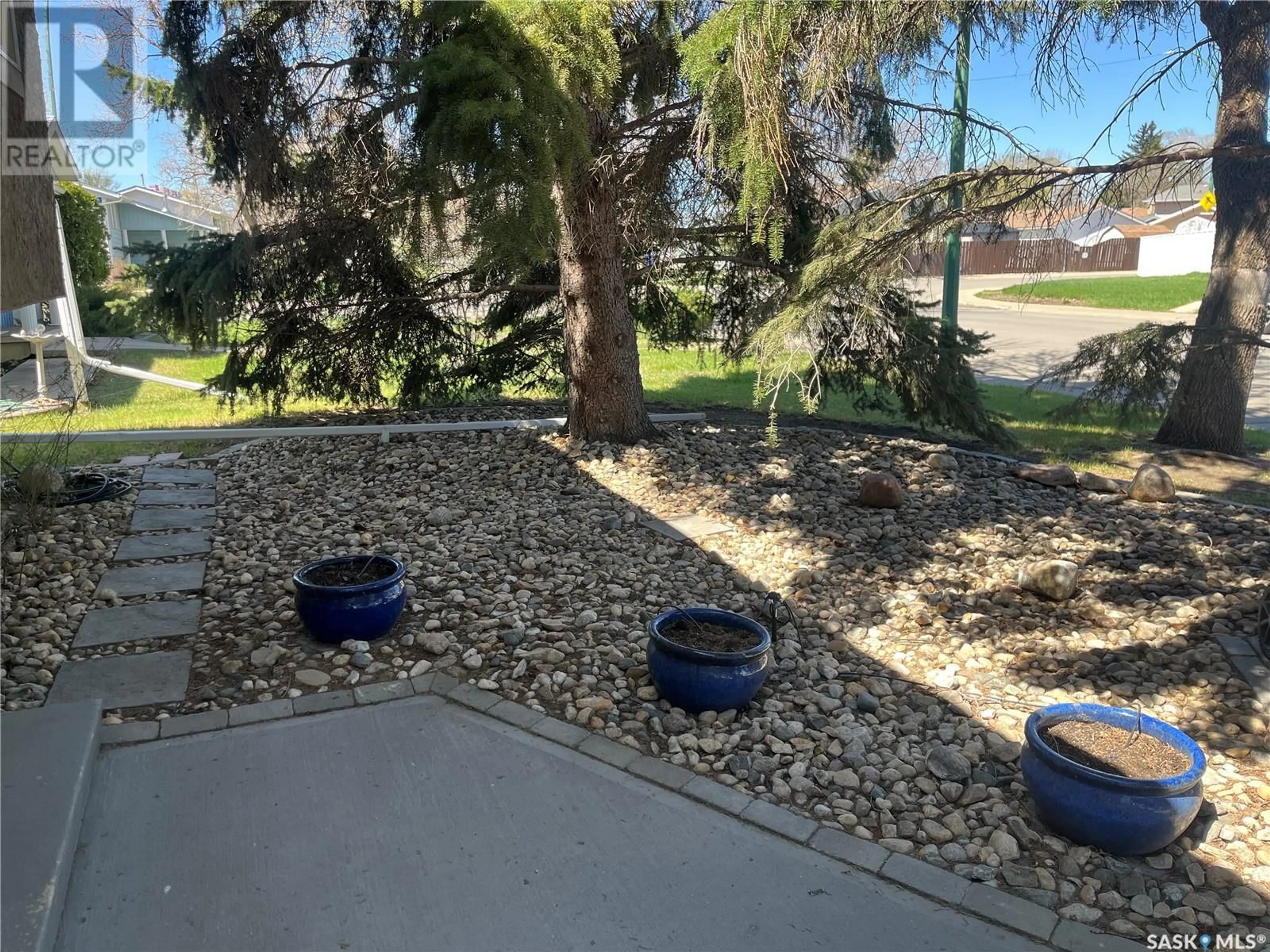 A pic from outside/outdoor area/front of a property/back of a property/a pic from drone, water/lake/river/ocean view for 62 MCSHERRY CRESCENT, Regina Saskatchewan S4T7B7