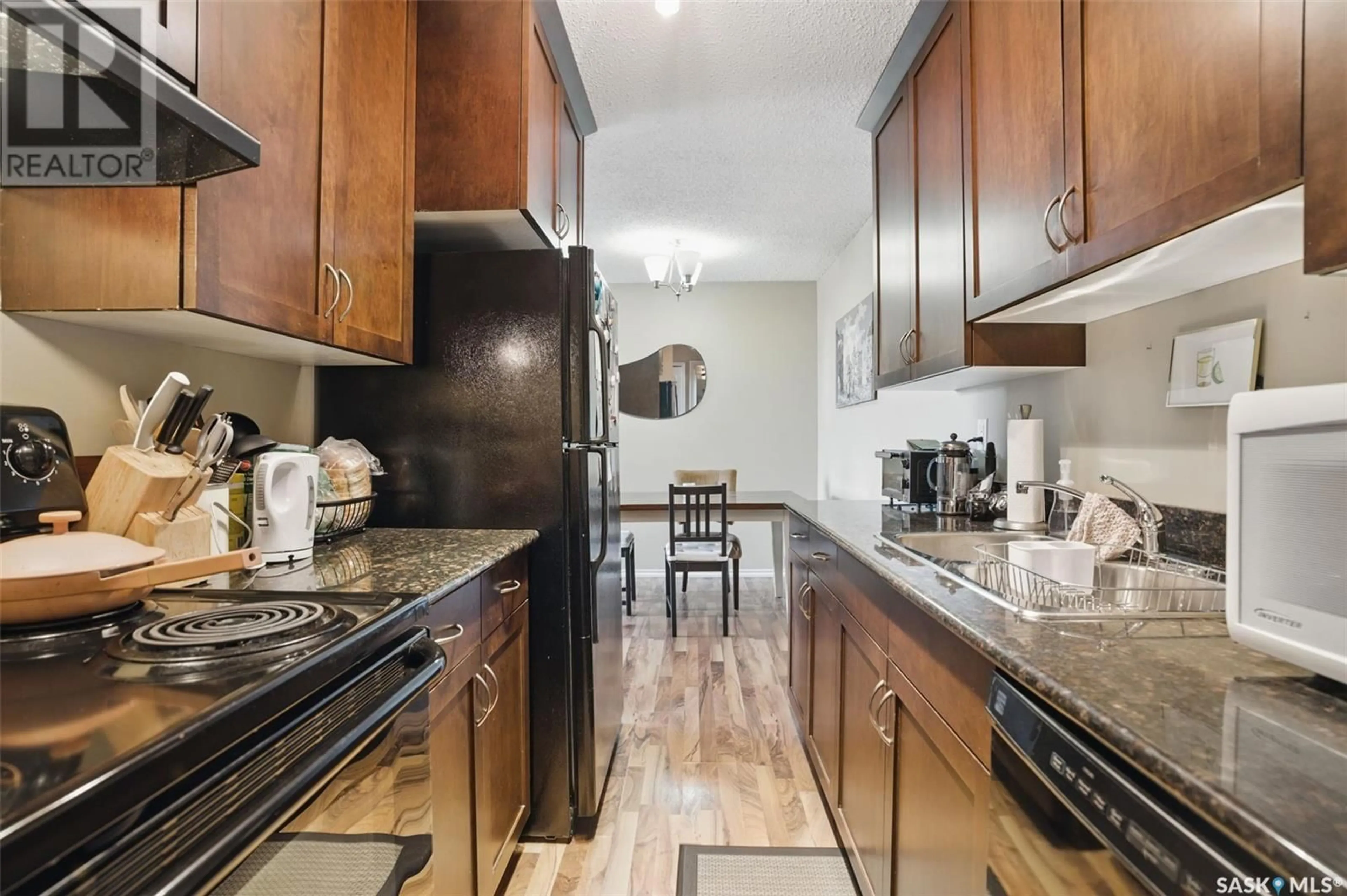 Open concept kitchen, unknown for 404 1013 LANSDOWNE AVENUE, Saskatoon Saskatchewan S7H2C2