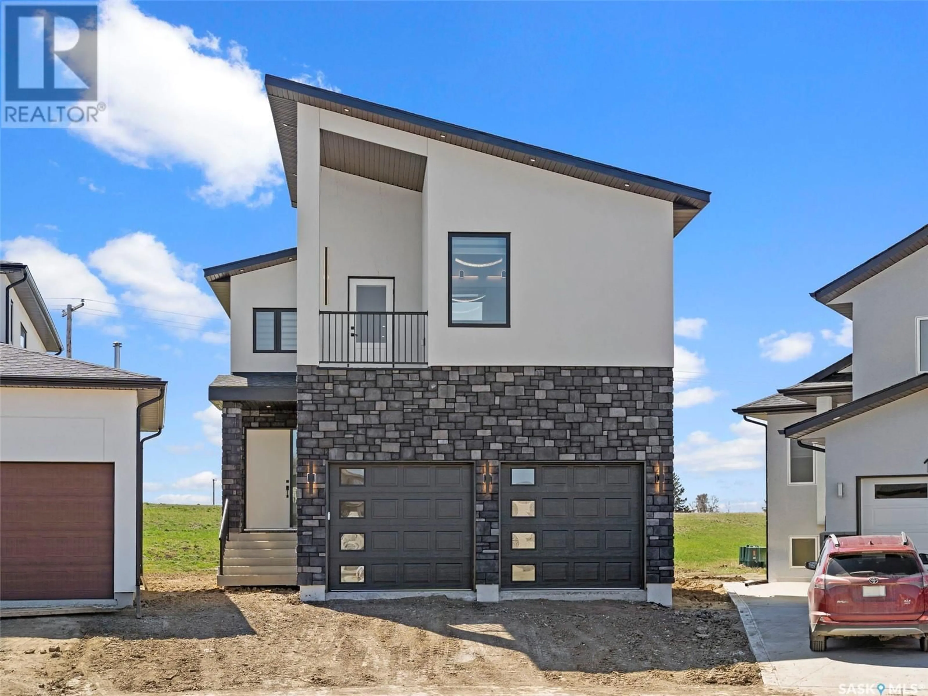 Home with brick exterior material, street for 134 MAZUREK CRESCENT, Saskatoon Saskatchewan S7V1S1