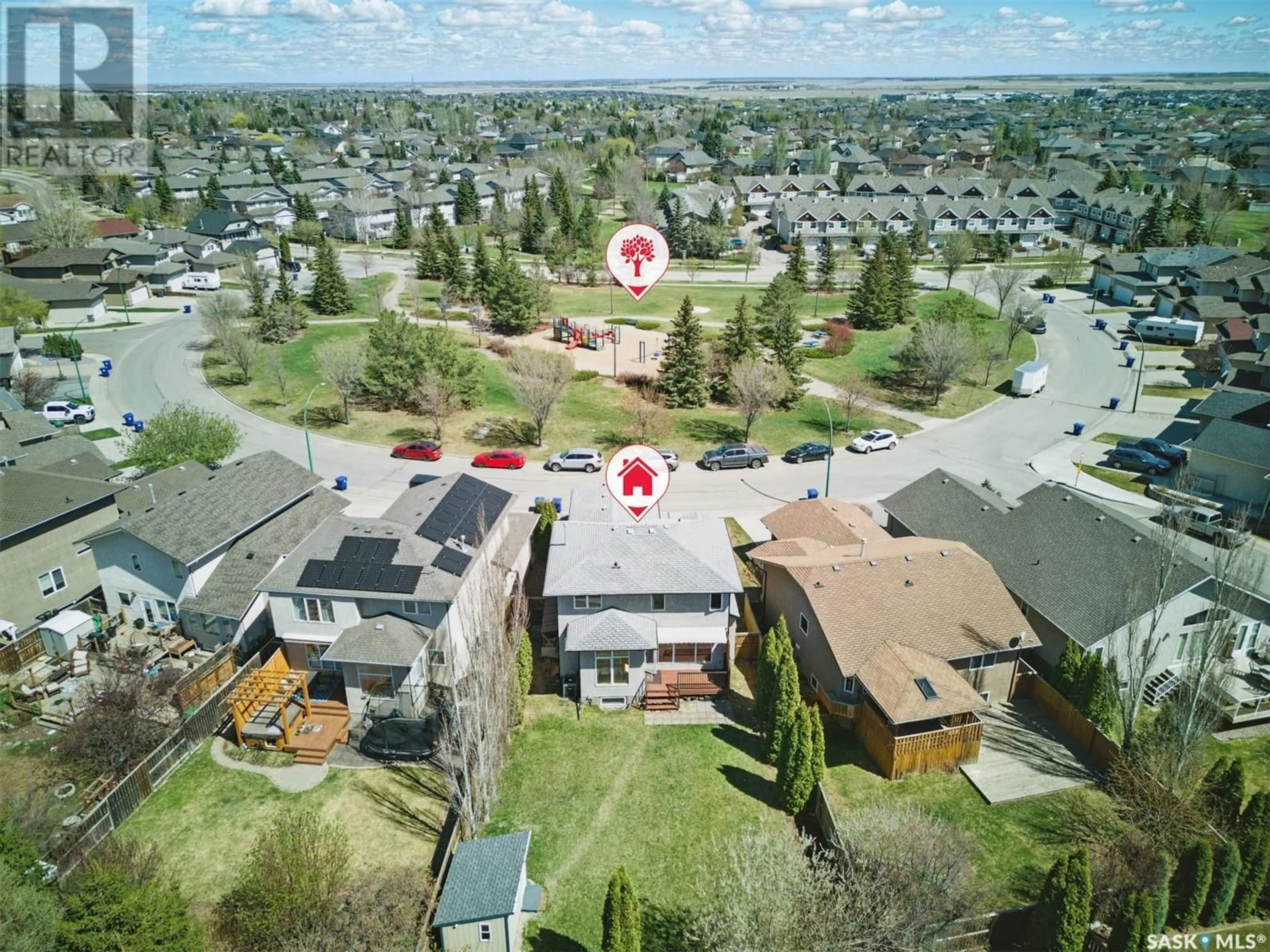 A pic from outside/outdoor area/front of a property/back of a property/a pic from drone, street for 211 BECKETT GREEN, Saskatoon Saskatchewan S7N4W6