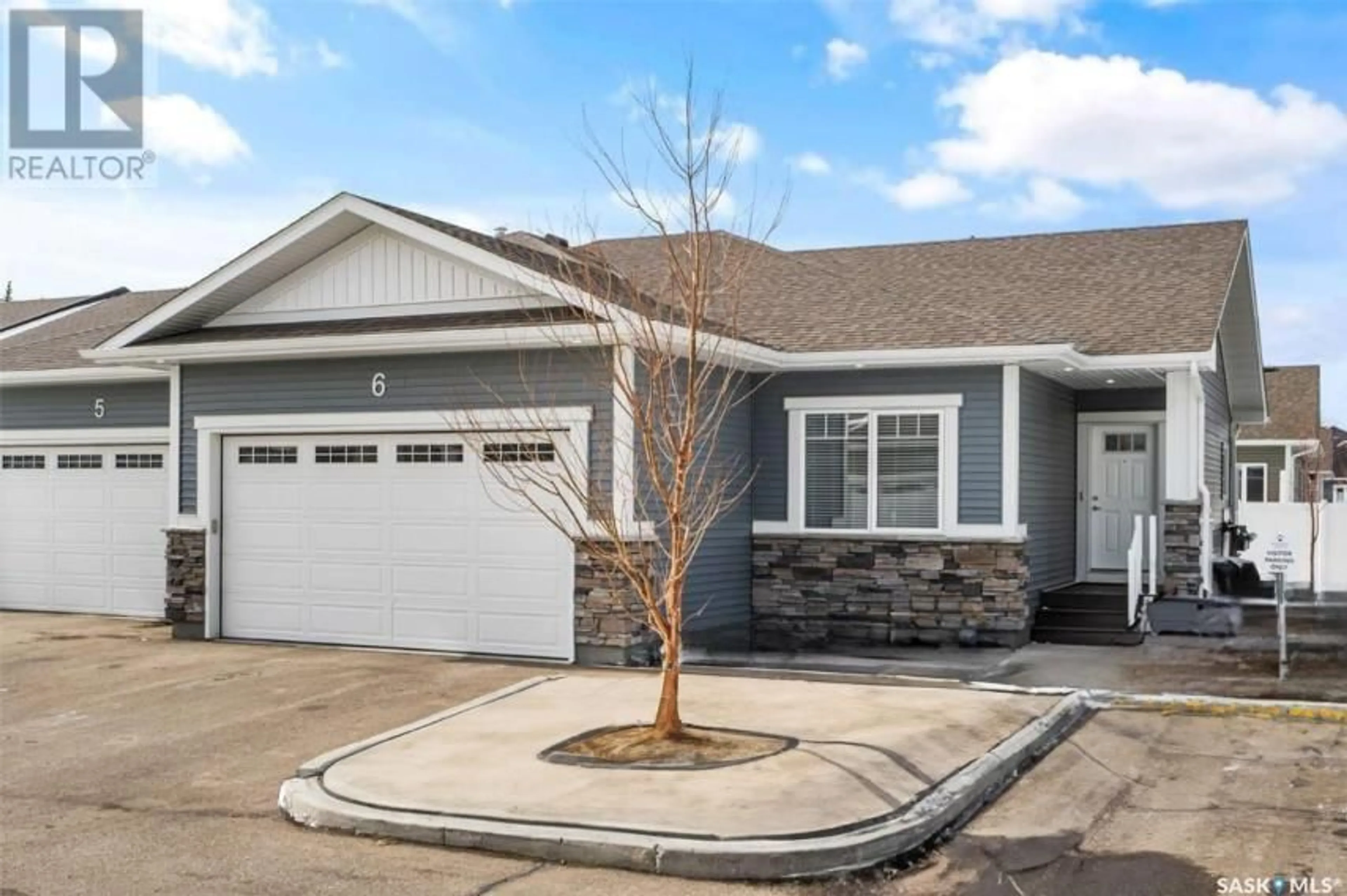 Home with vinyl exterior material, street for 6 - 3206 11TH STREET, Saskatoon Saskatchewan S7M5Z1