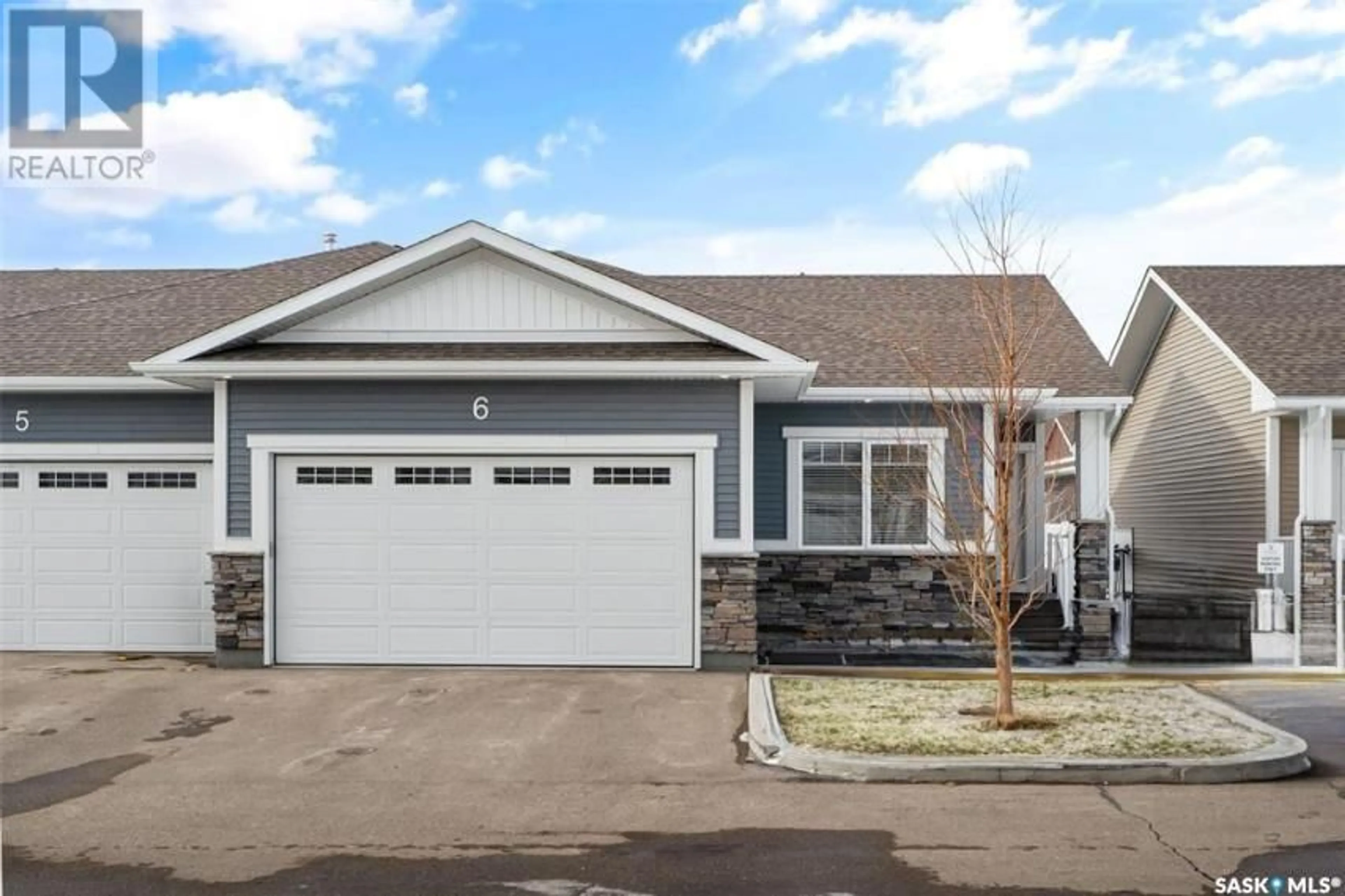 Home with vinyl exterior material, street for 6 - 3206 11TH STREET, Saskatoon Saskatchewan S7M5Z1