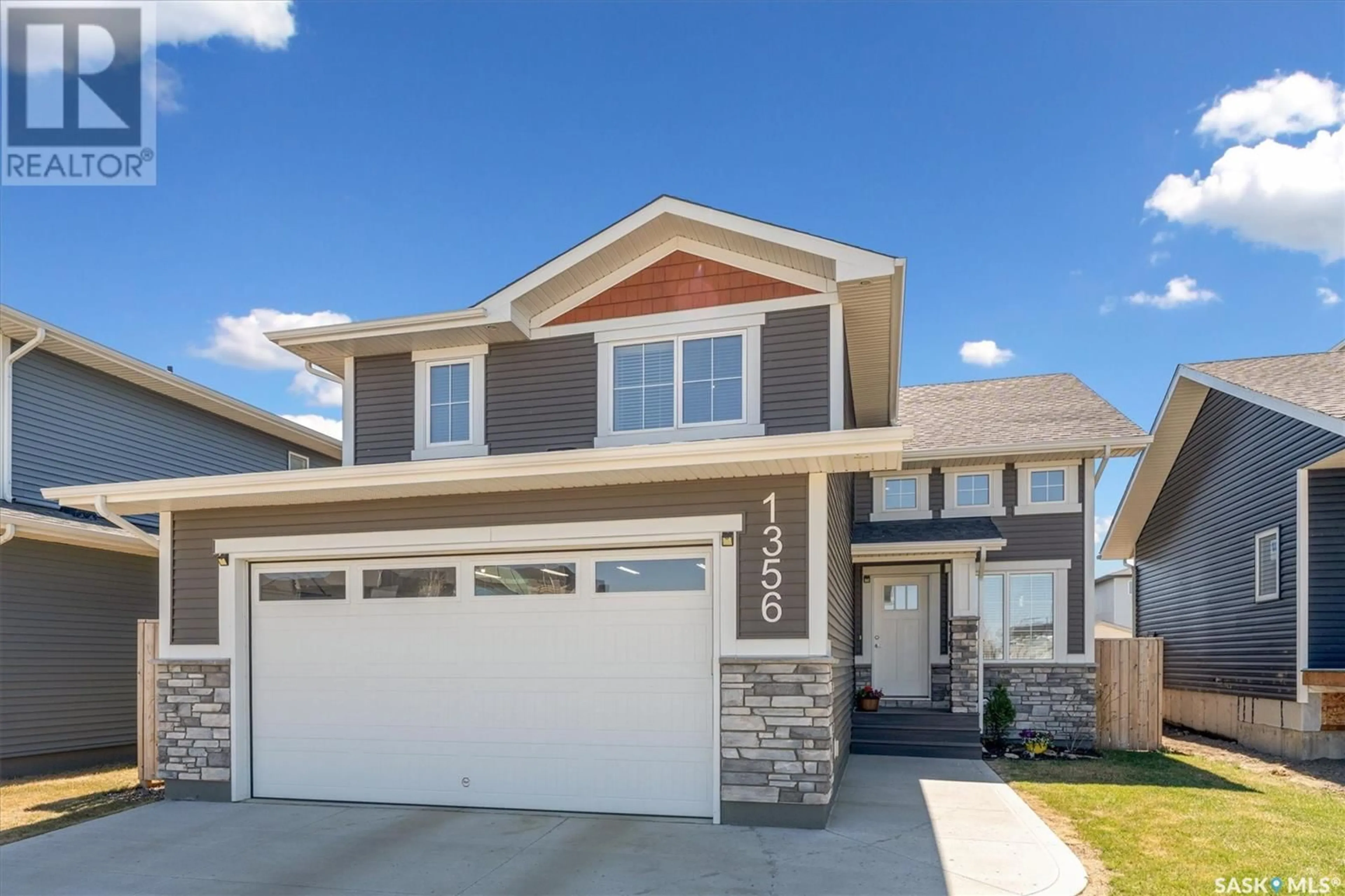 Home with vinyl exterior material, street for 1356 PARR HILL DRIVE, Martensville Saskatchewan S0K2T1