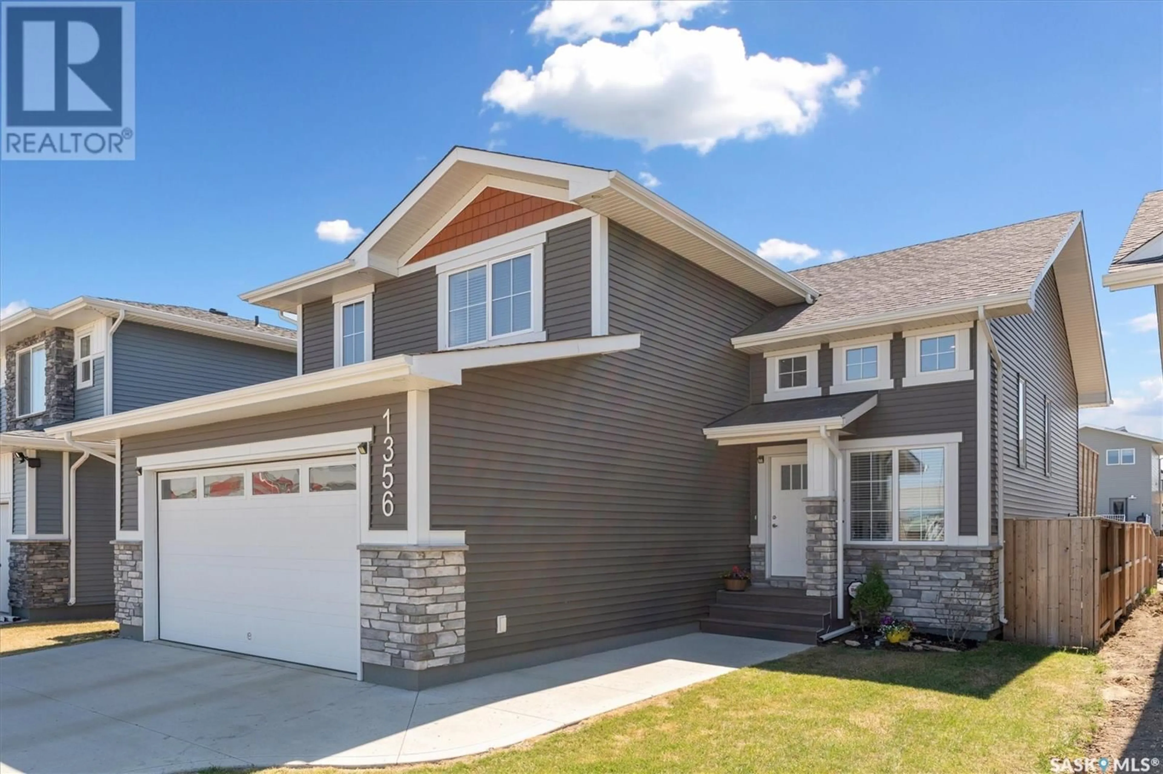 Home with vinyl exterior material, street for 1356 PARR HILL DRIVE, Martensville Saskatchewan S0K2T1